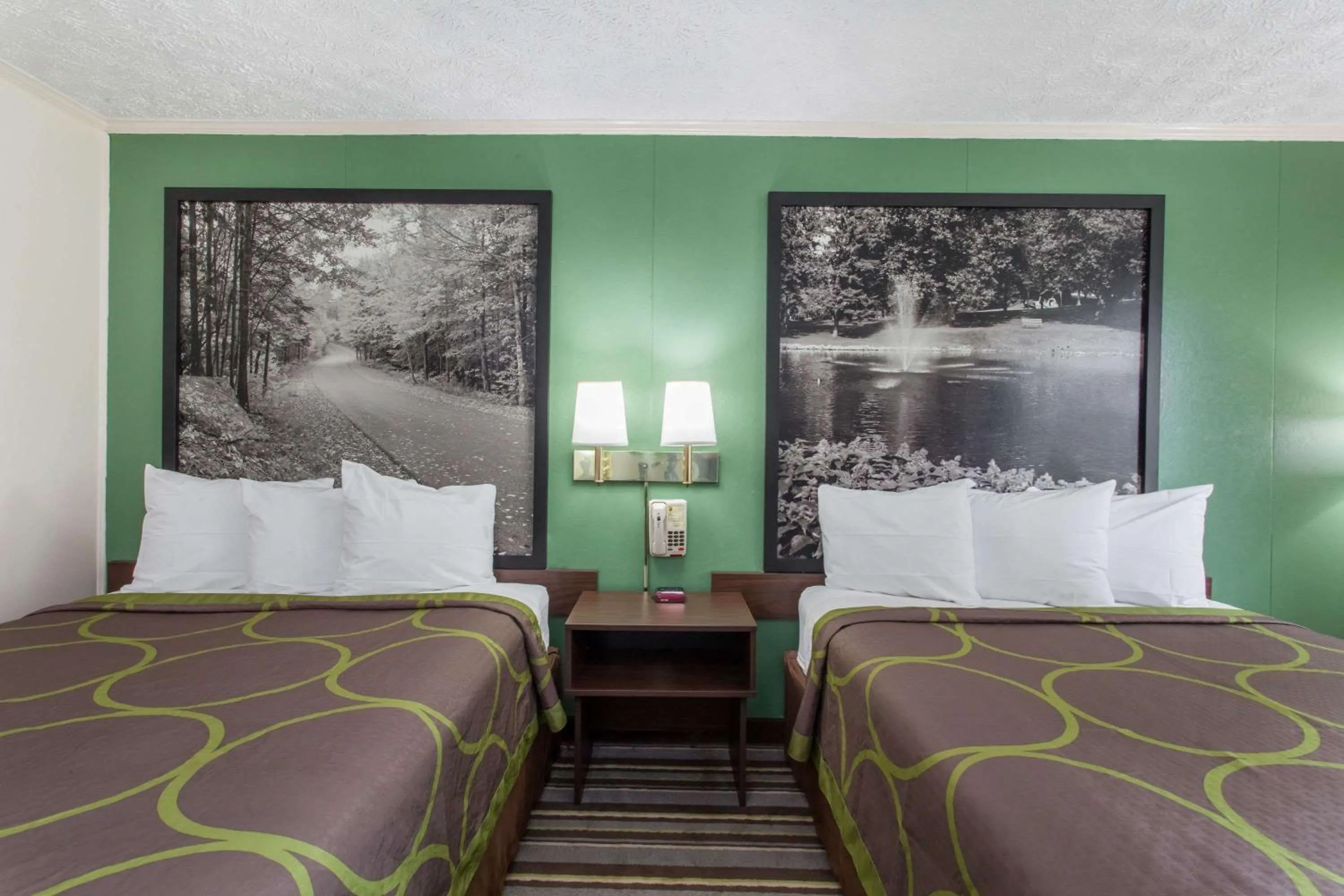 On site, Bed in Executive East Syracuse Hotel