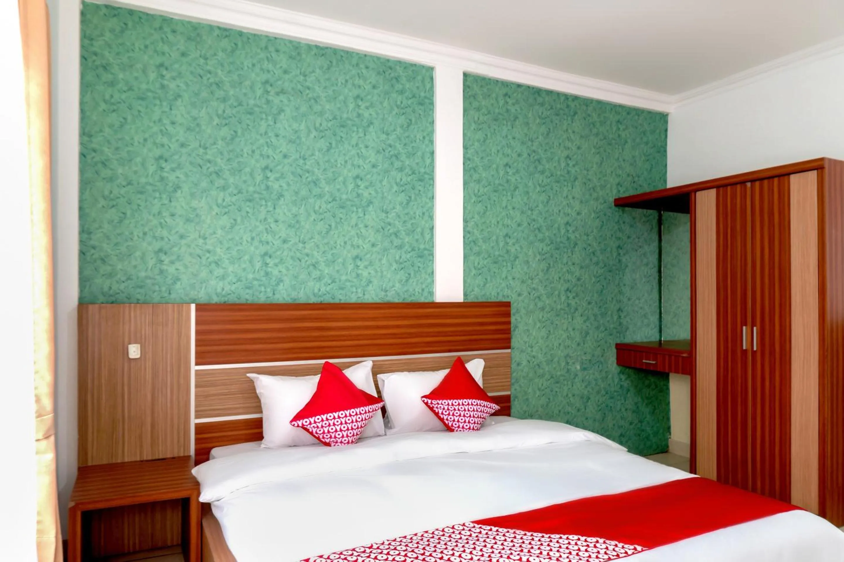 Bedroom in SUPER OYO 617 Sukaraja Residence Syariah