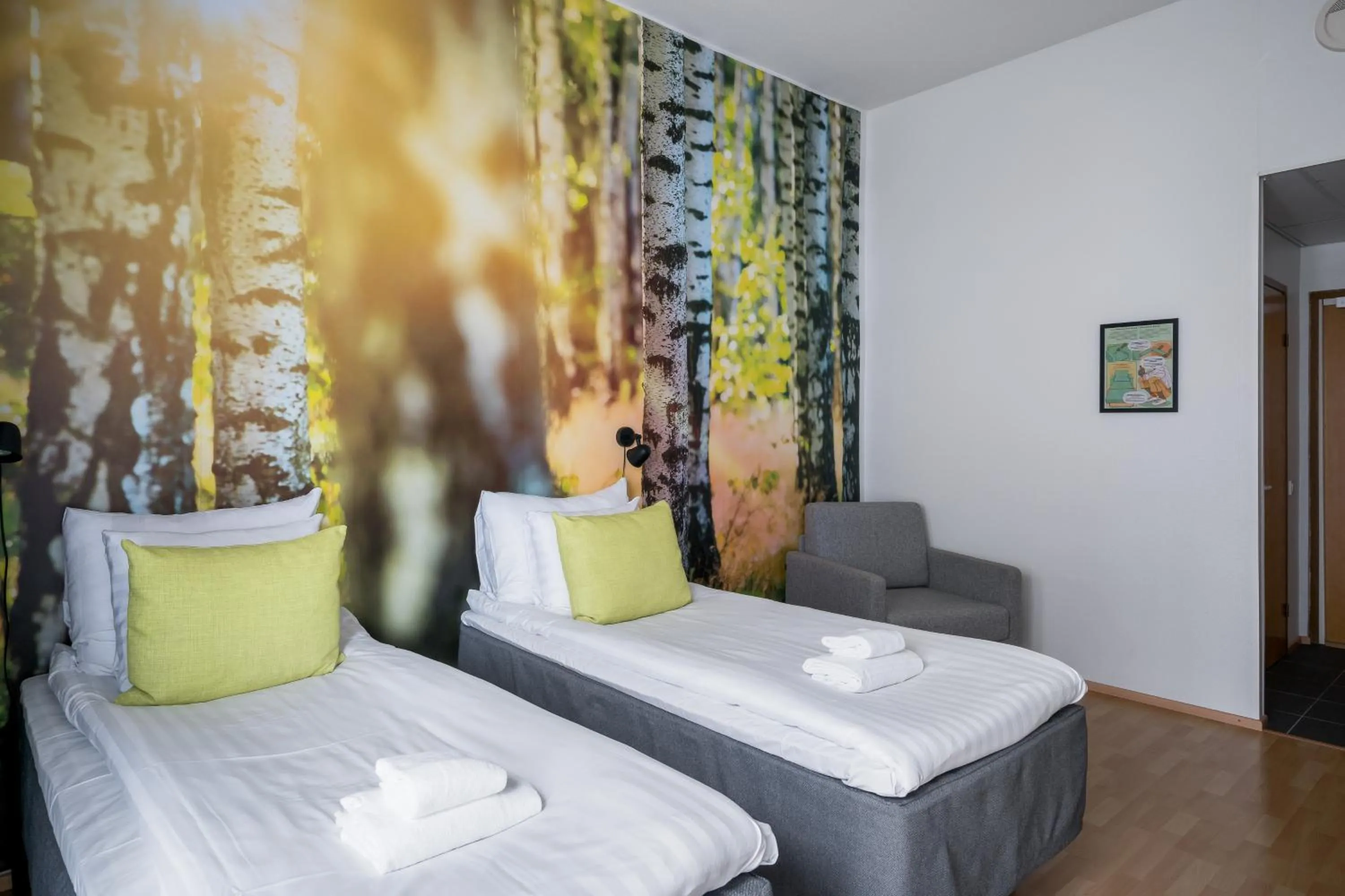 Bed in Hiisi Hotel Lohja