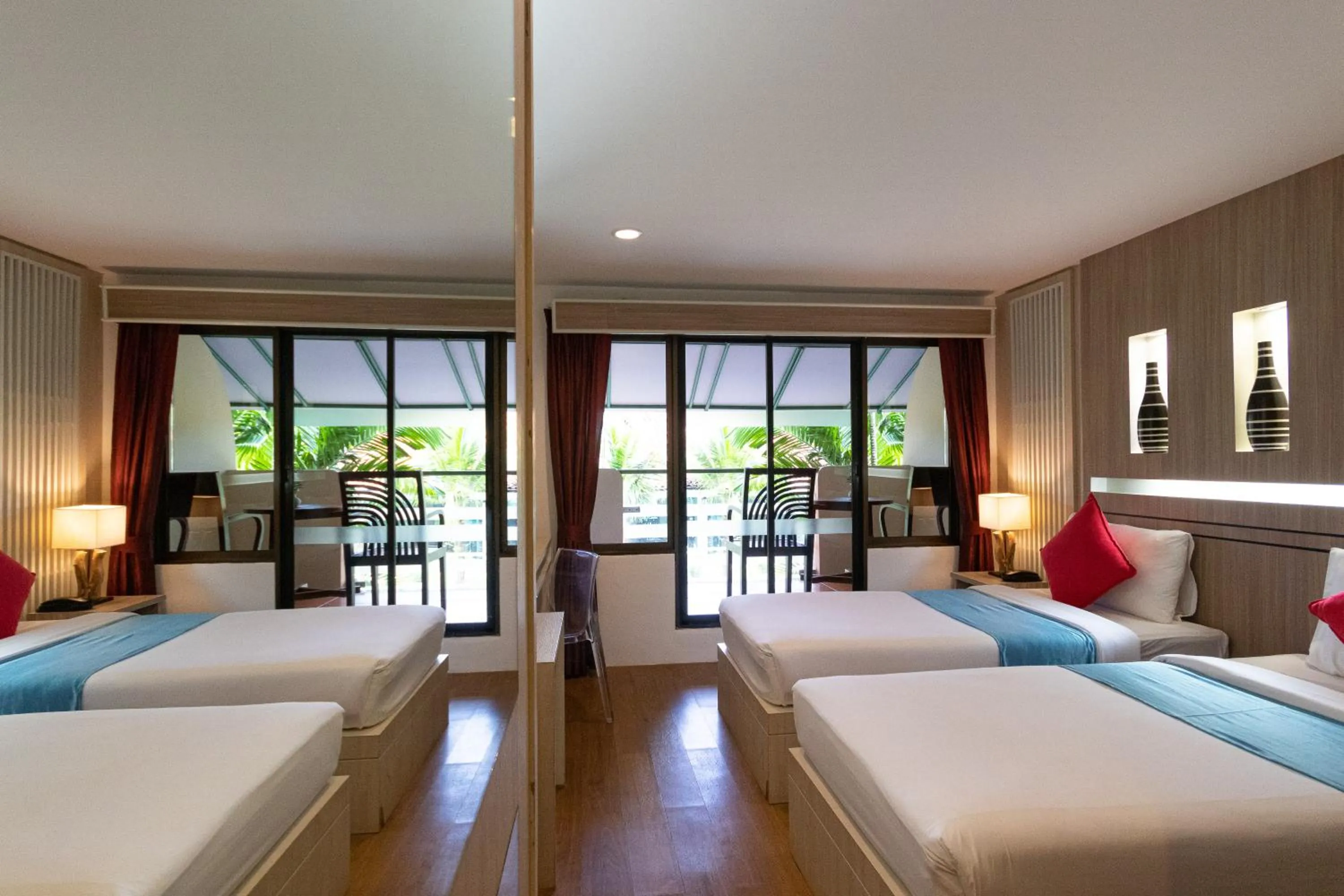 Photo of the whole room, Bed in Aochalong Villa Resort & Spa - SHA Plus