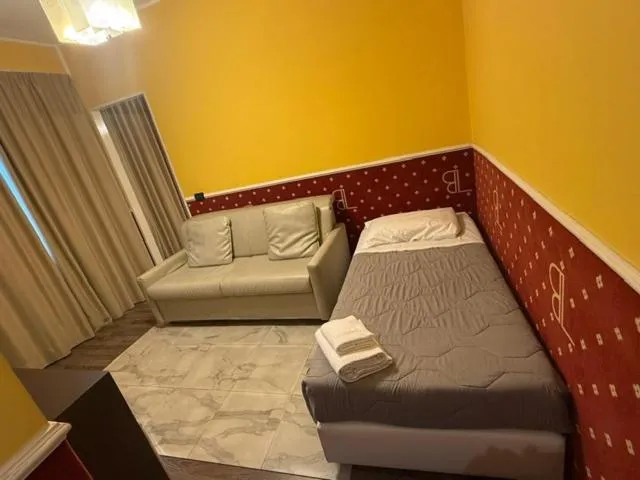 Bed in Hotel Laguna Residence