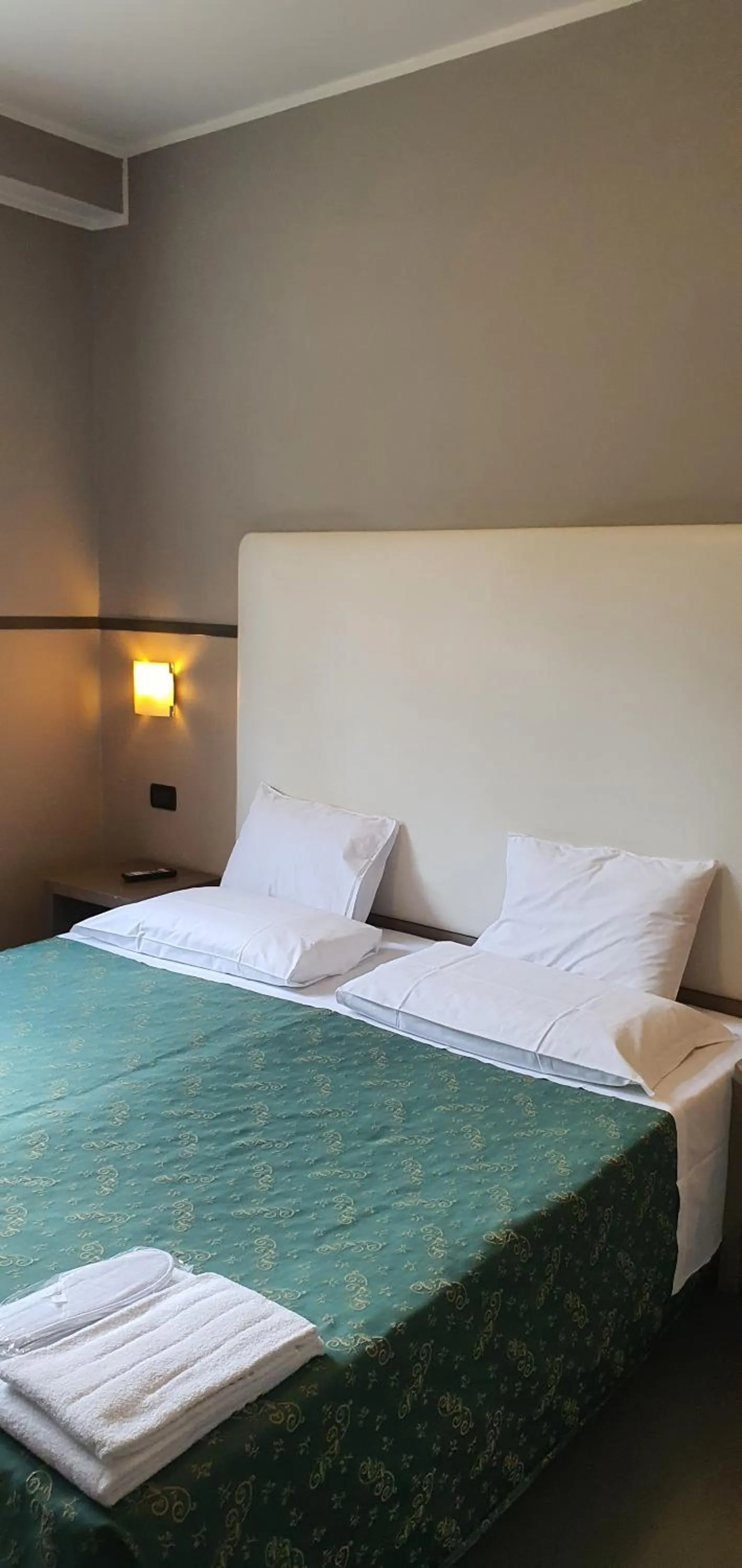 Property building, Bed in Hotel Laguna Residence