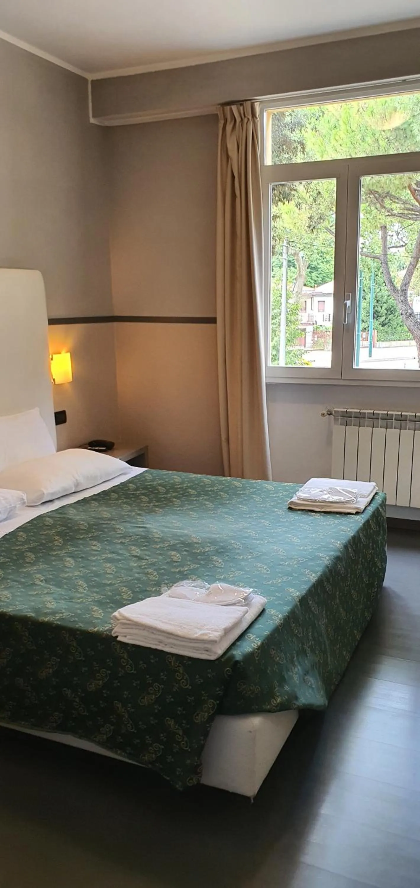 Property building, Bed in Hotel Laguna Residence