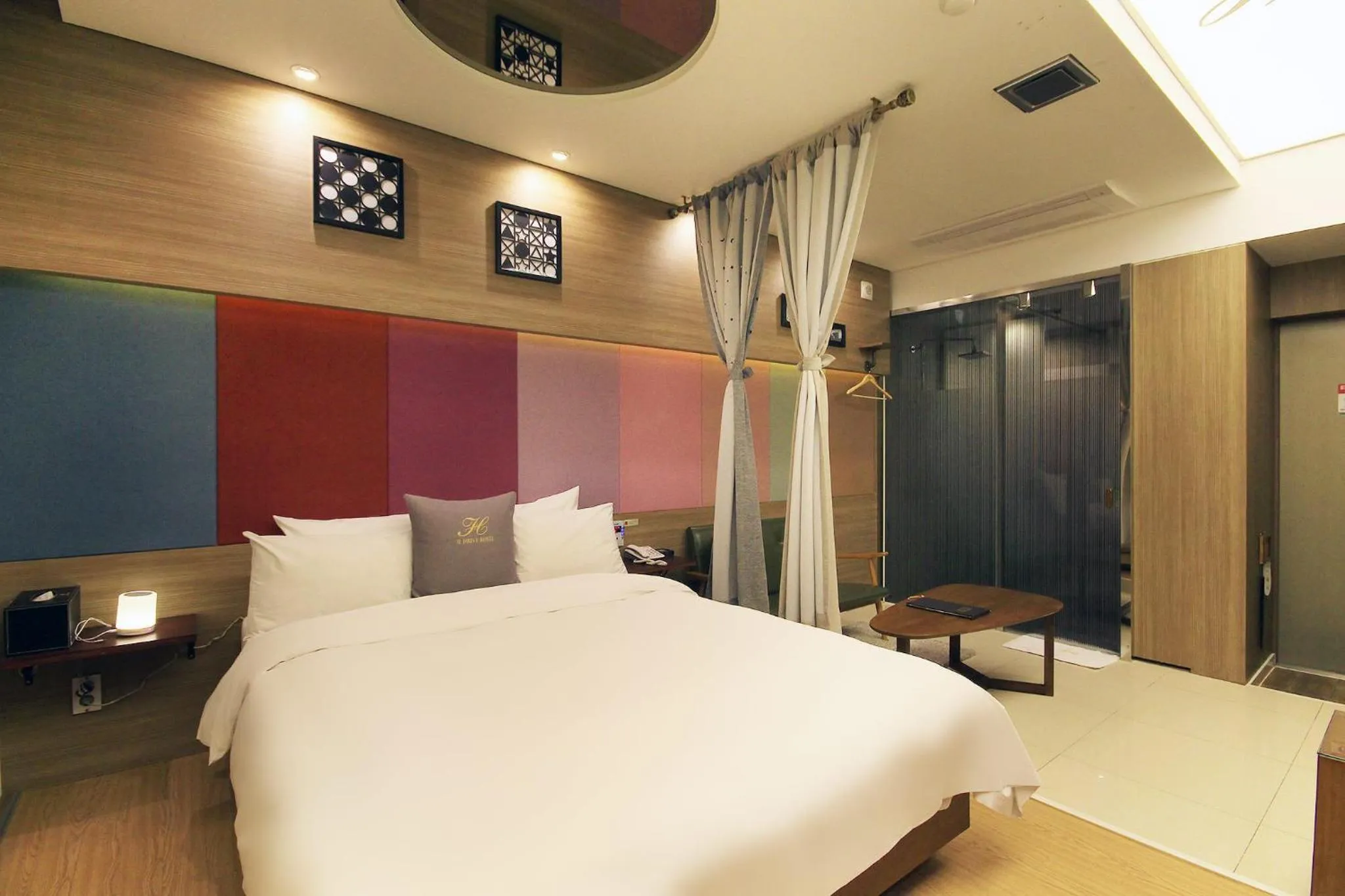 Bed in H Drive Hotel