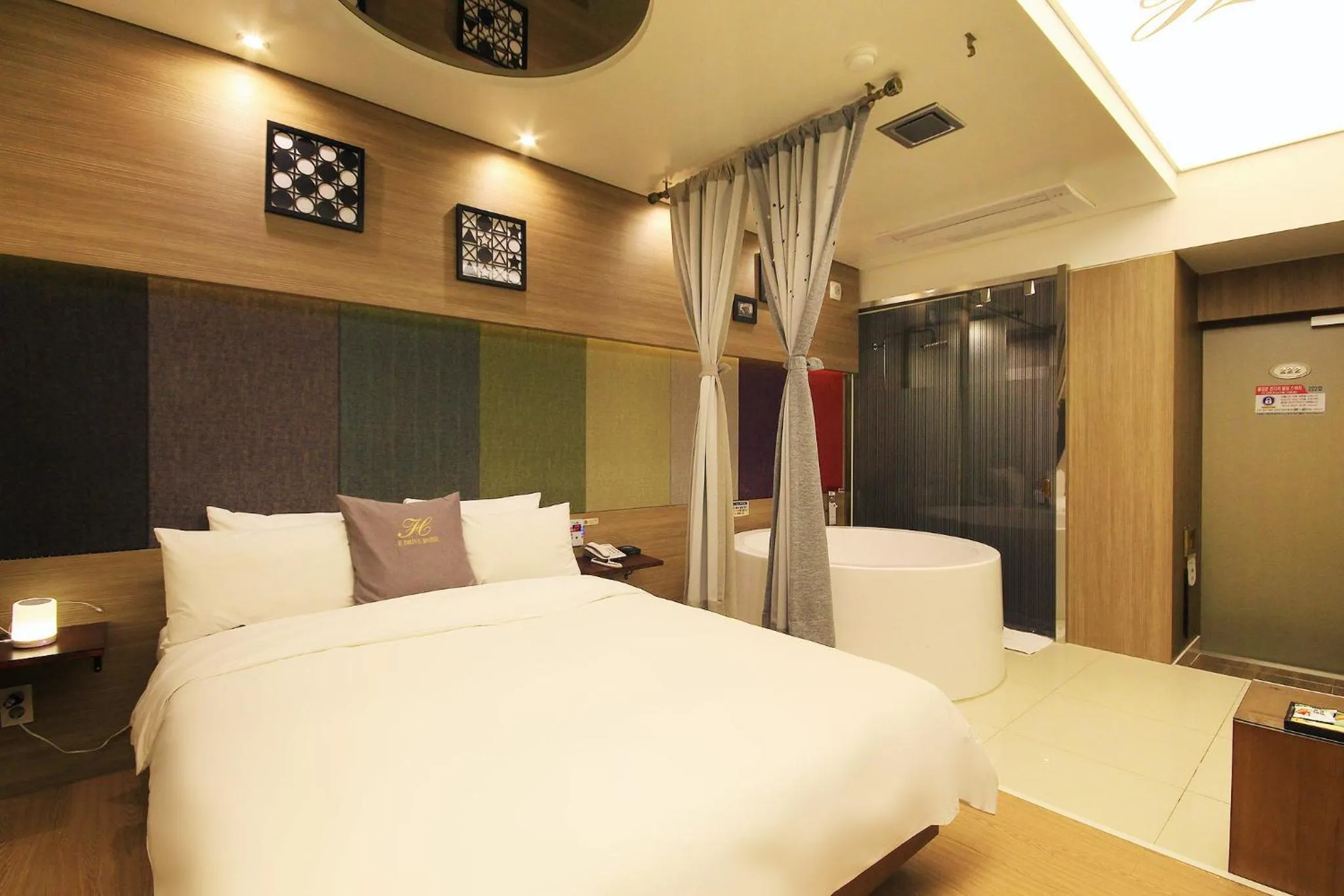 Bed in H Drive Hotel