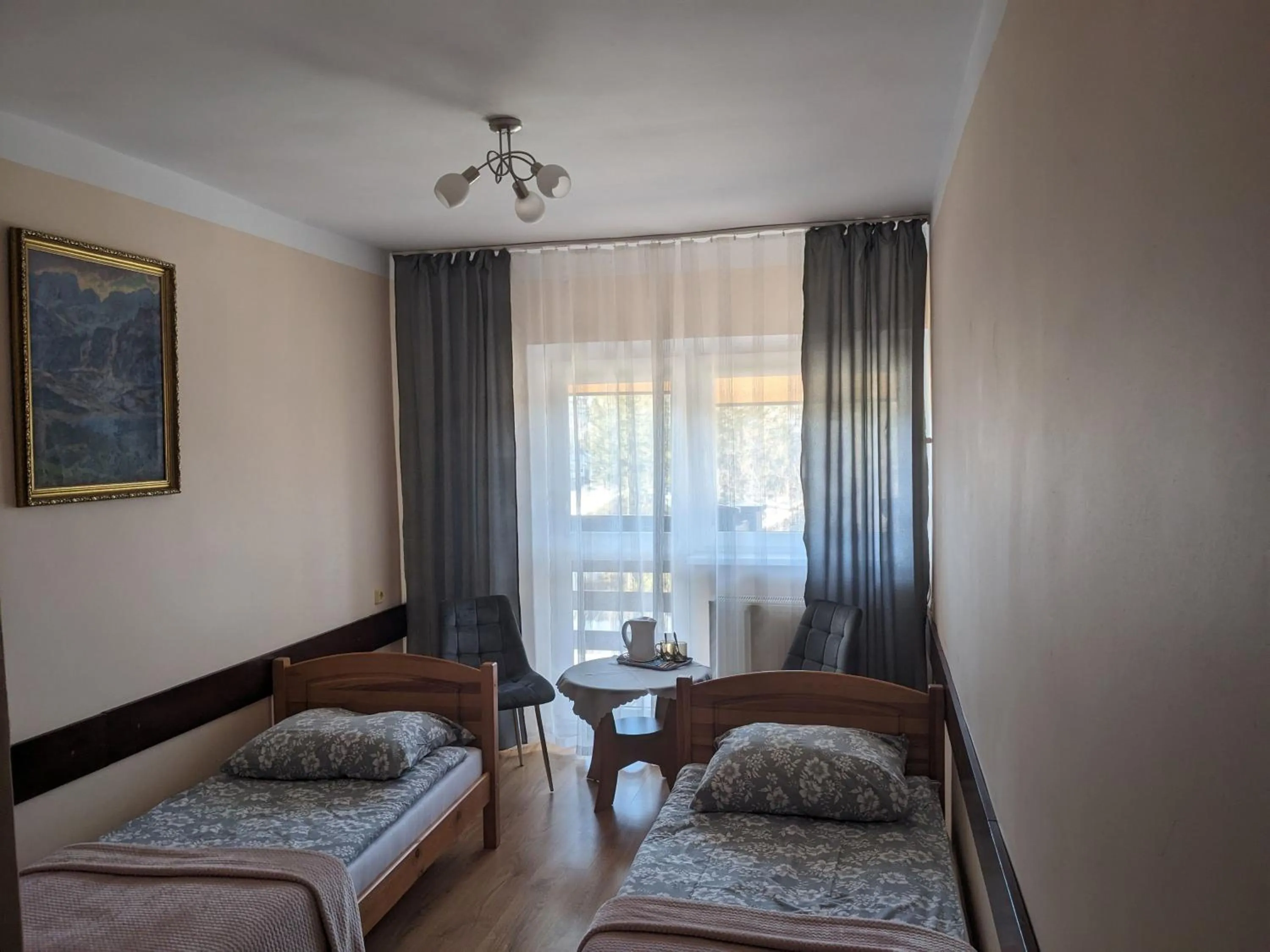 Communal lounge/ TV room, Bed in Dom wczasowy Przy Skałkach