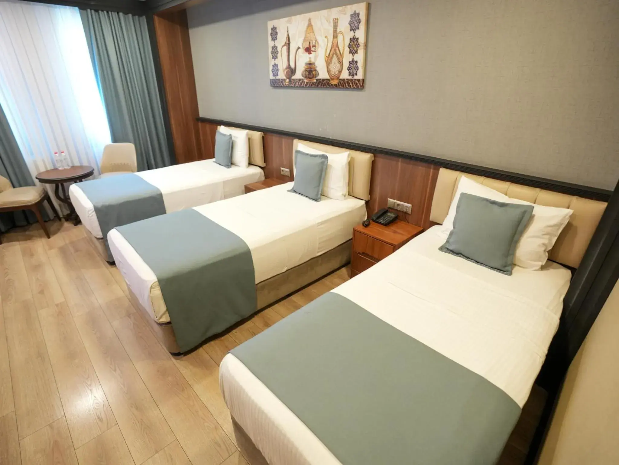 Standard Triple Room in Valens Hotel Downtown Standard Triple Room in Valens Hotel Downtown