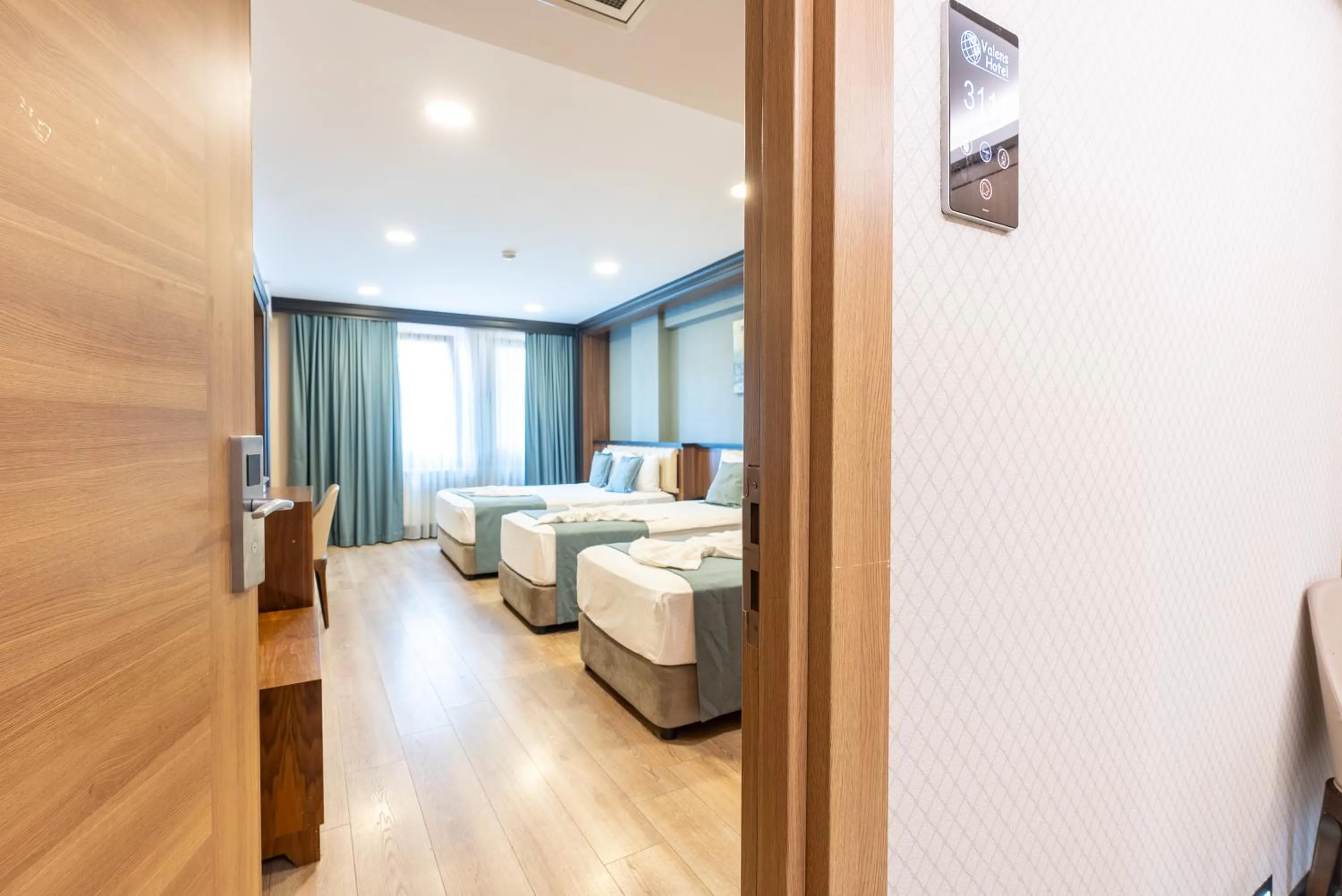 Bed in Valens Hotel Downtown