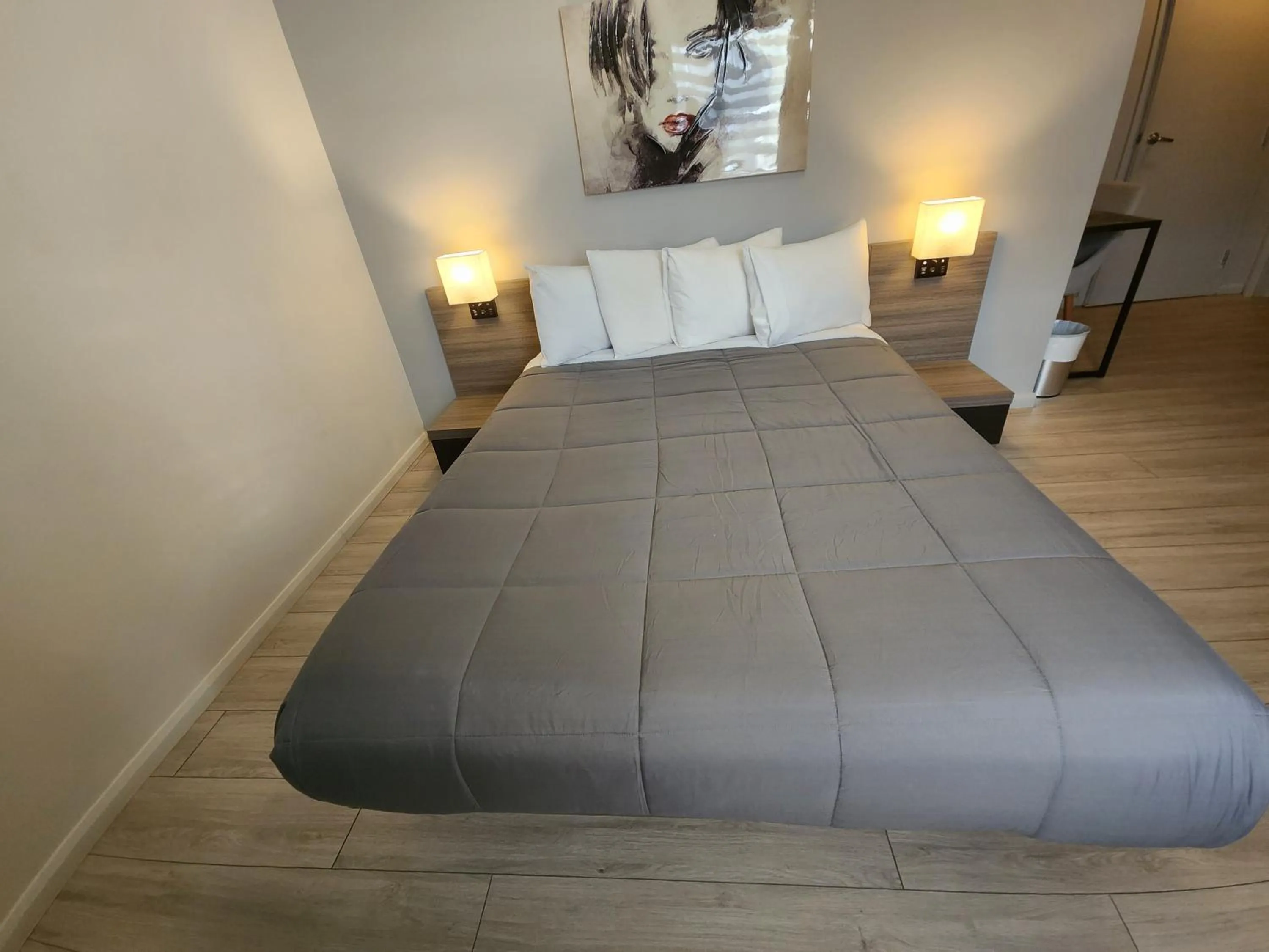 Bed in Motel Le Victo