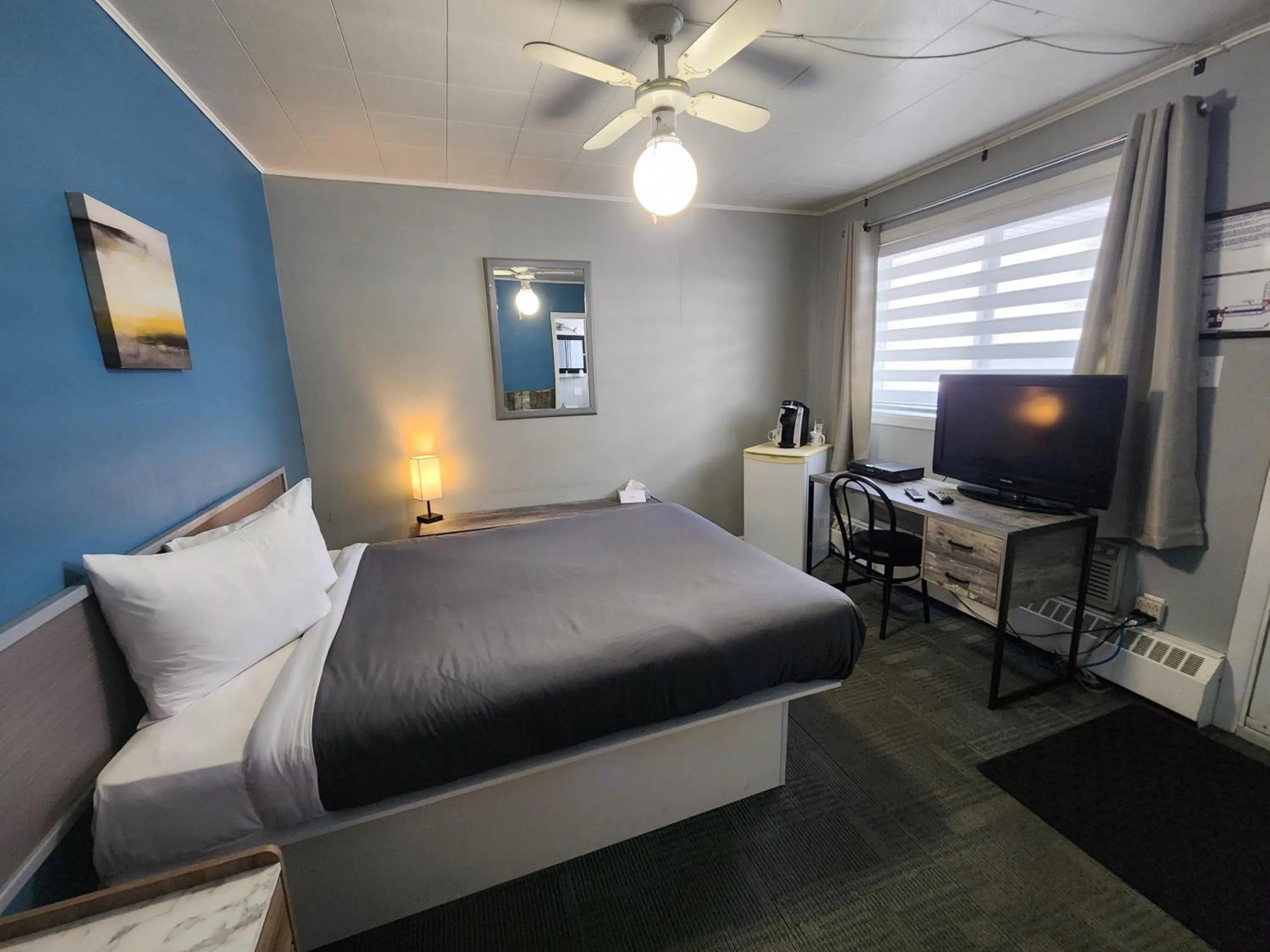 Bed in Motel Le Victo