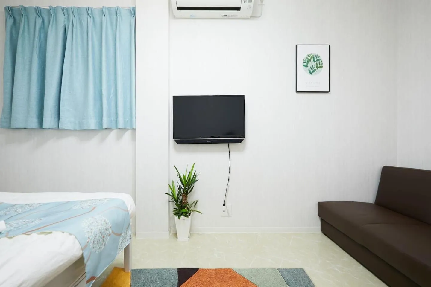 Bed in Mitsuba Guest House