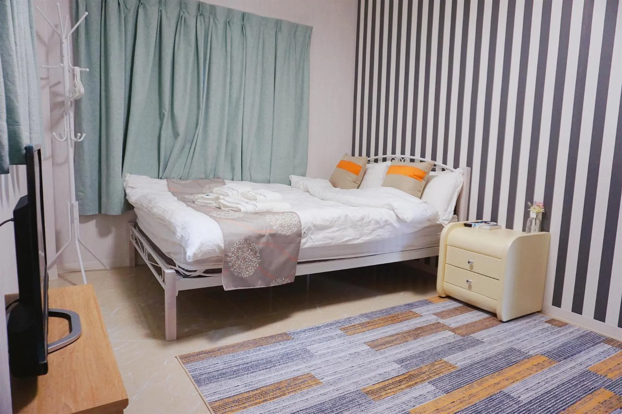 Bed in Mitsuba Guest House