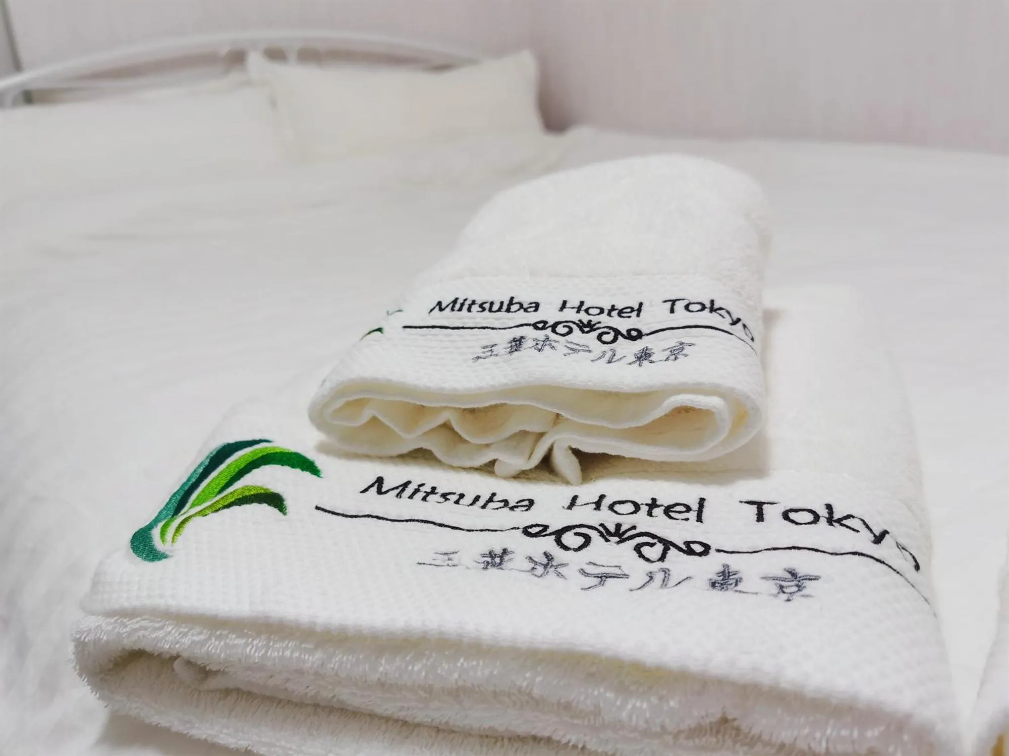 Bed in Mitsuba Guest House