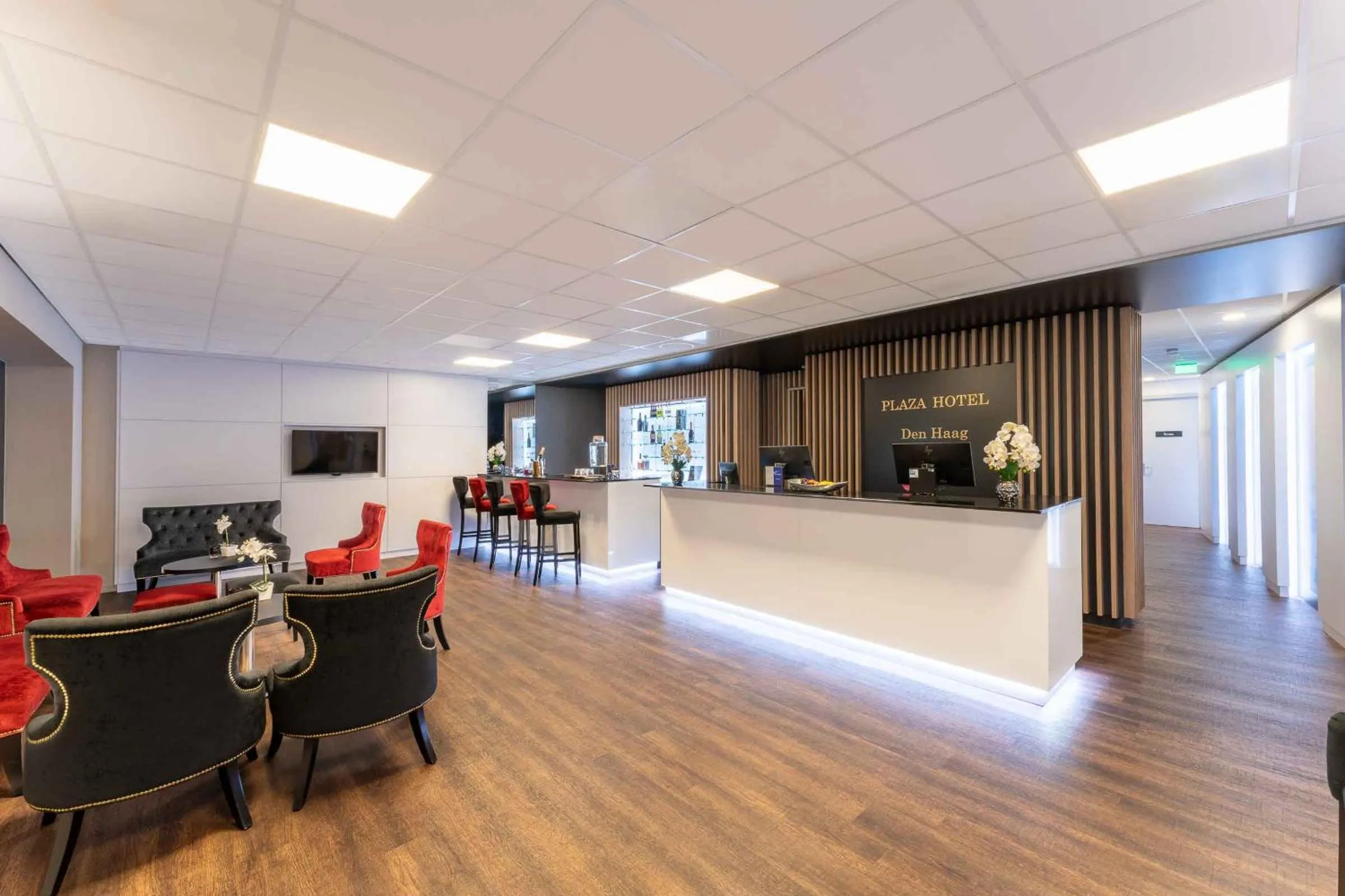 Lobby or reception in PLAZA Premium Den Haag City Center