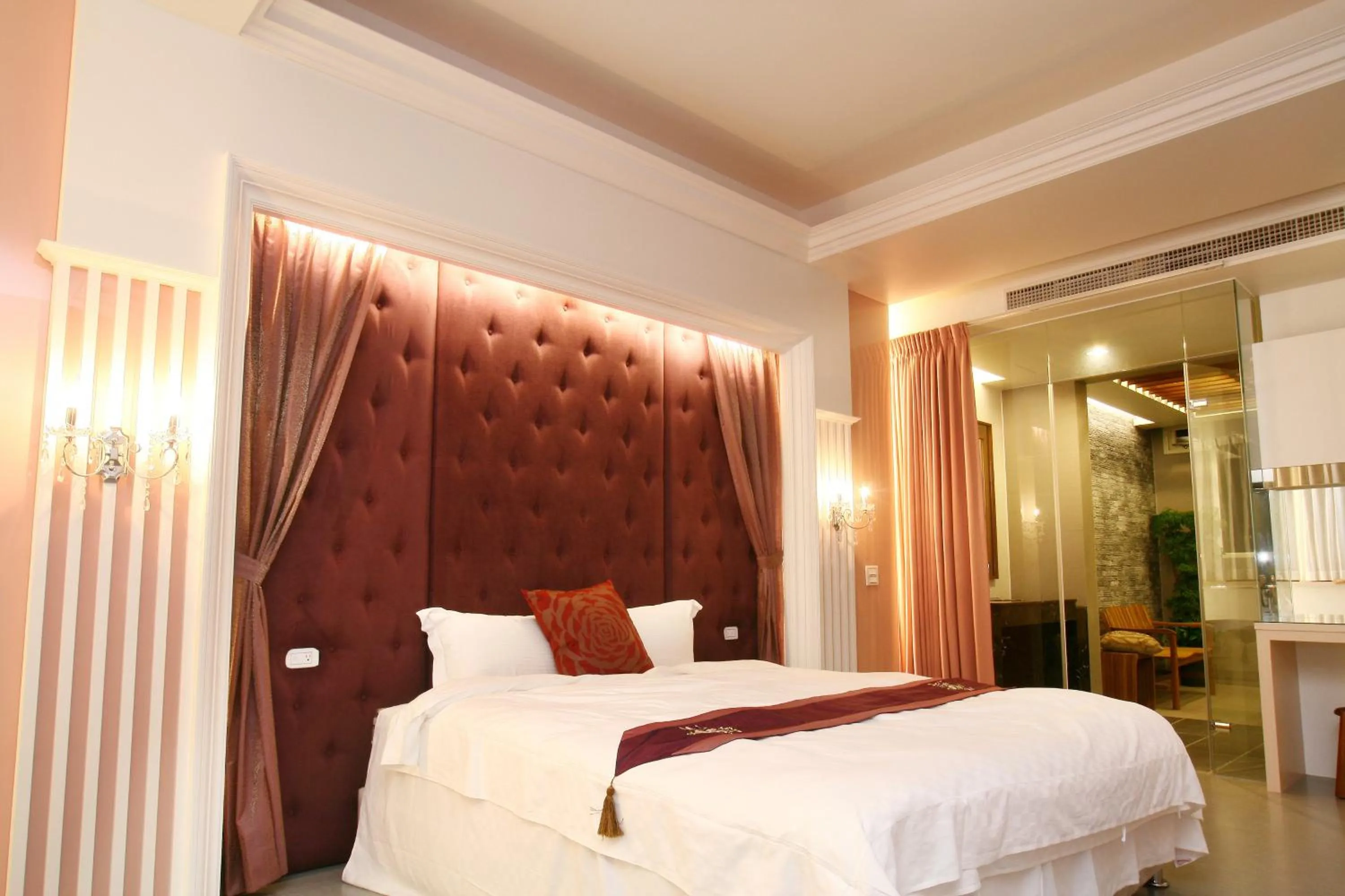 Bed in Spring Fountain Hotel