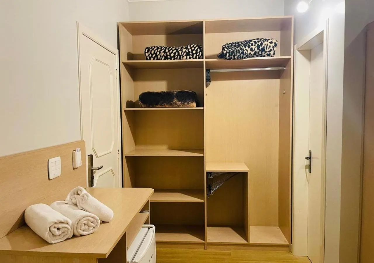 Bedroom in Dona Adelia Hotel e Restaurante