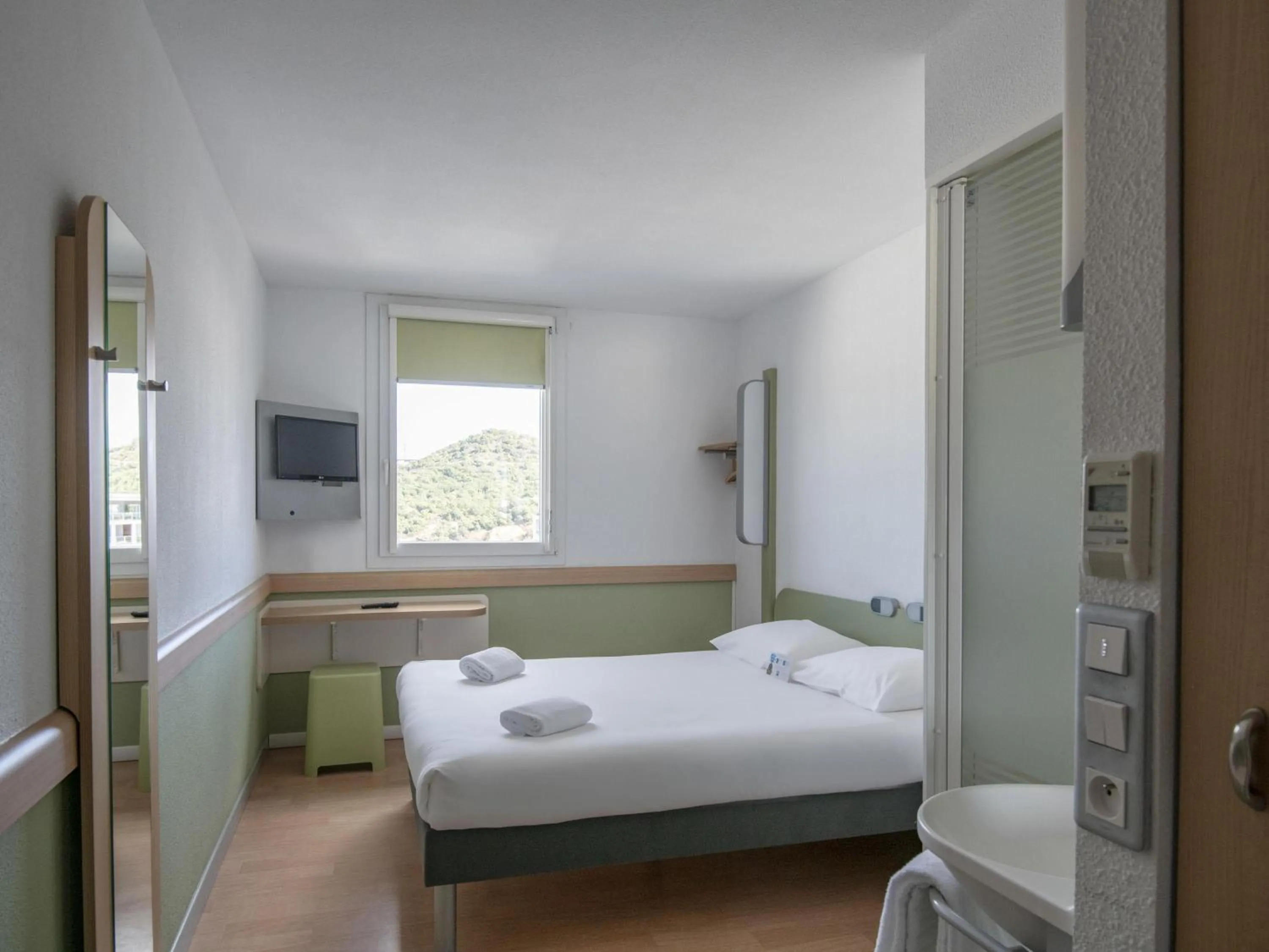 Bedroom, Bed in ibis budget Ajaccio