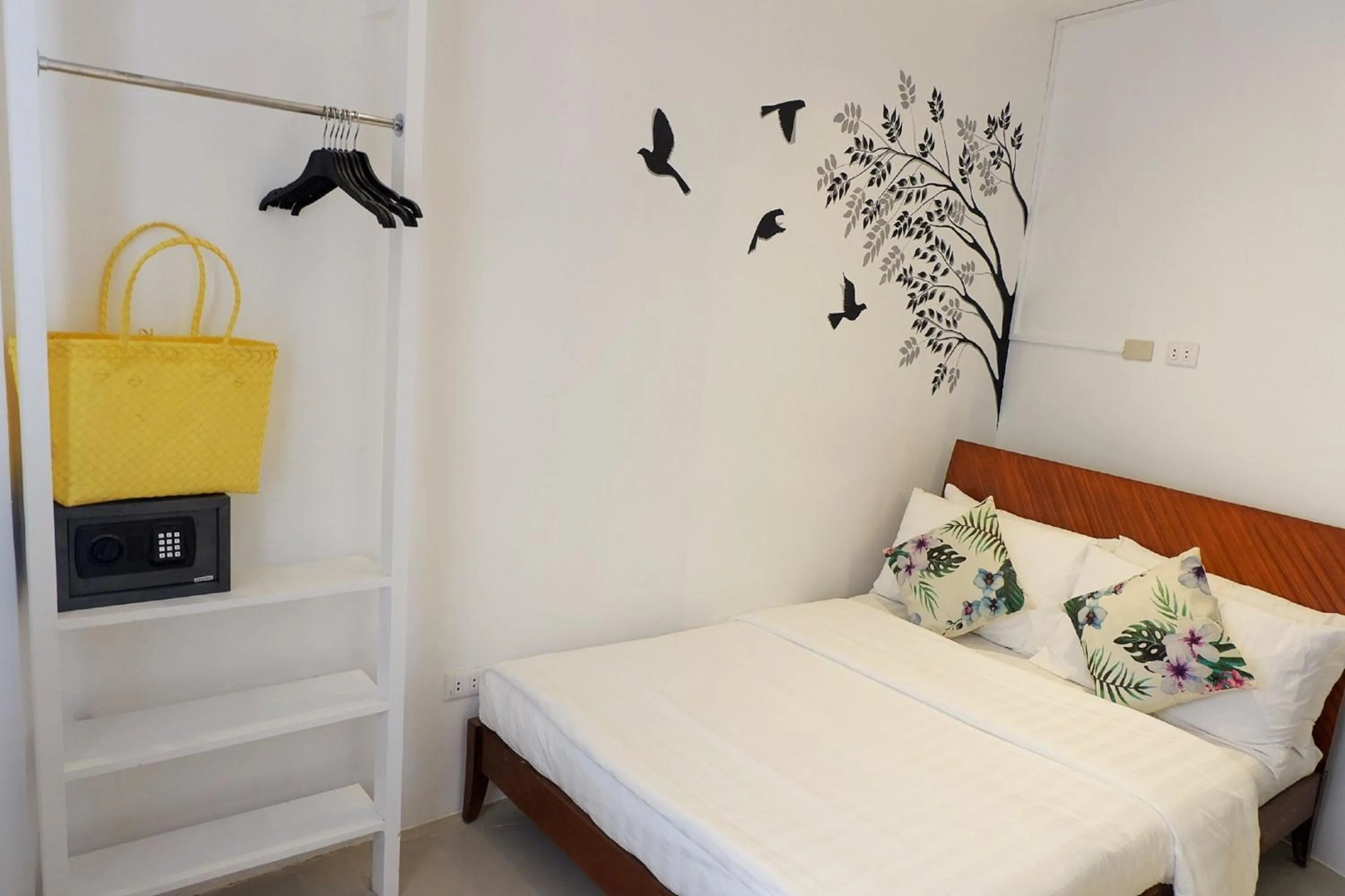 Bed in Kamusta Boutique Hotel