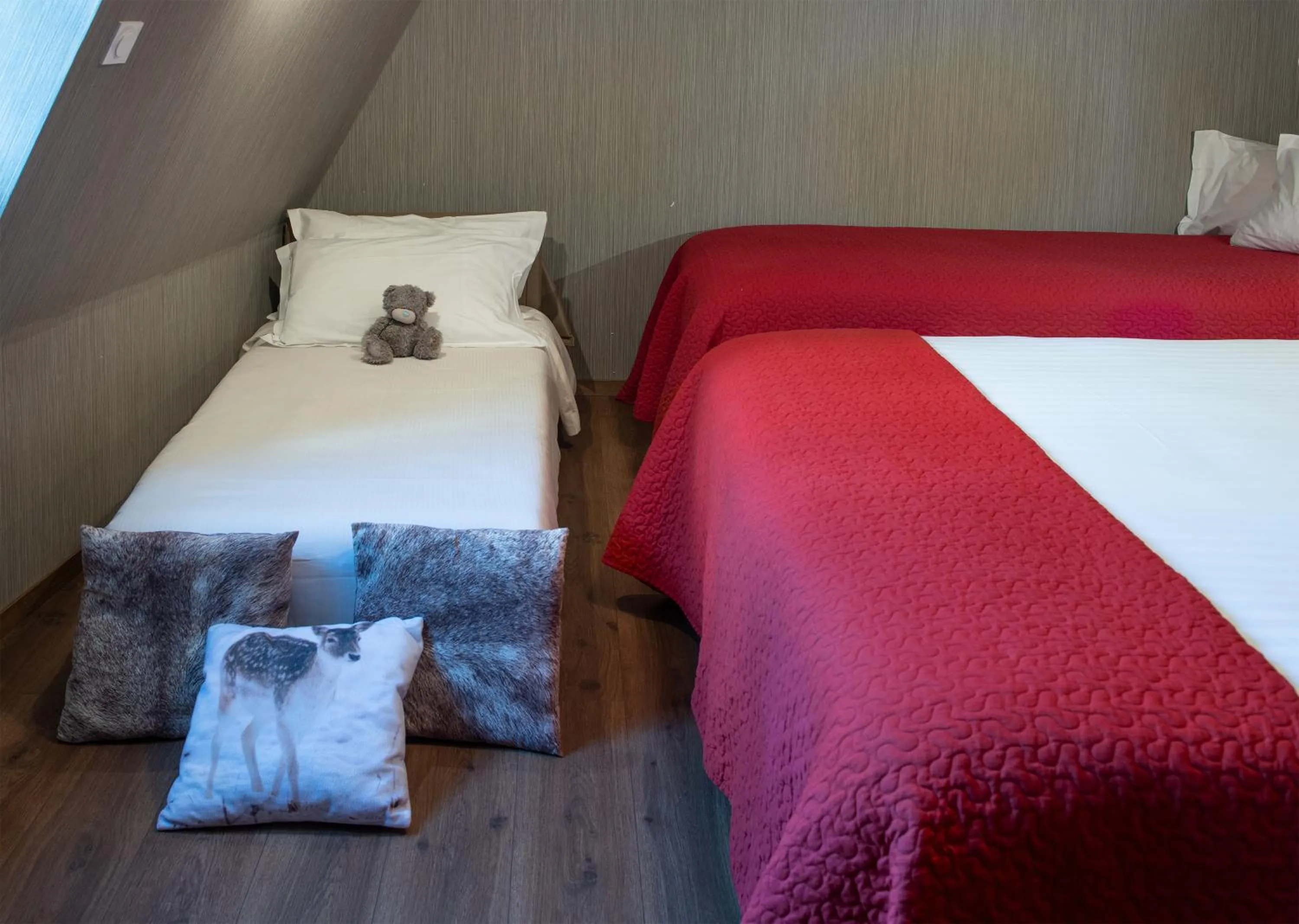 Bed in Logis Hôtel-restaurant Les Coudercous