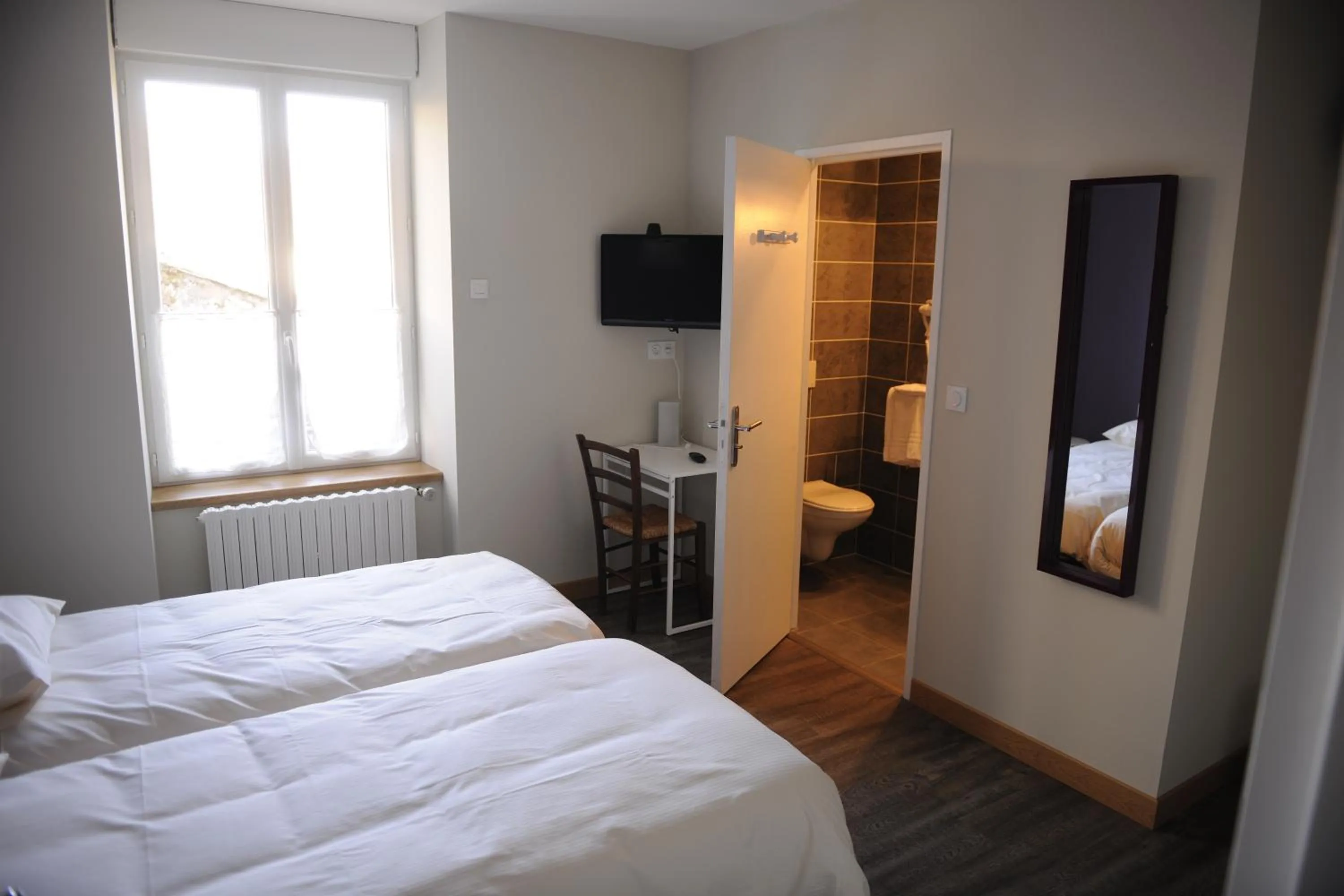 Photo of the whole room, Bed in Logis Hôtel-restaurant Les Coudercous