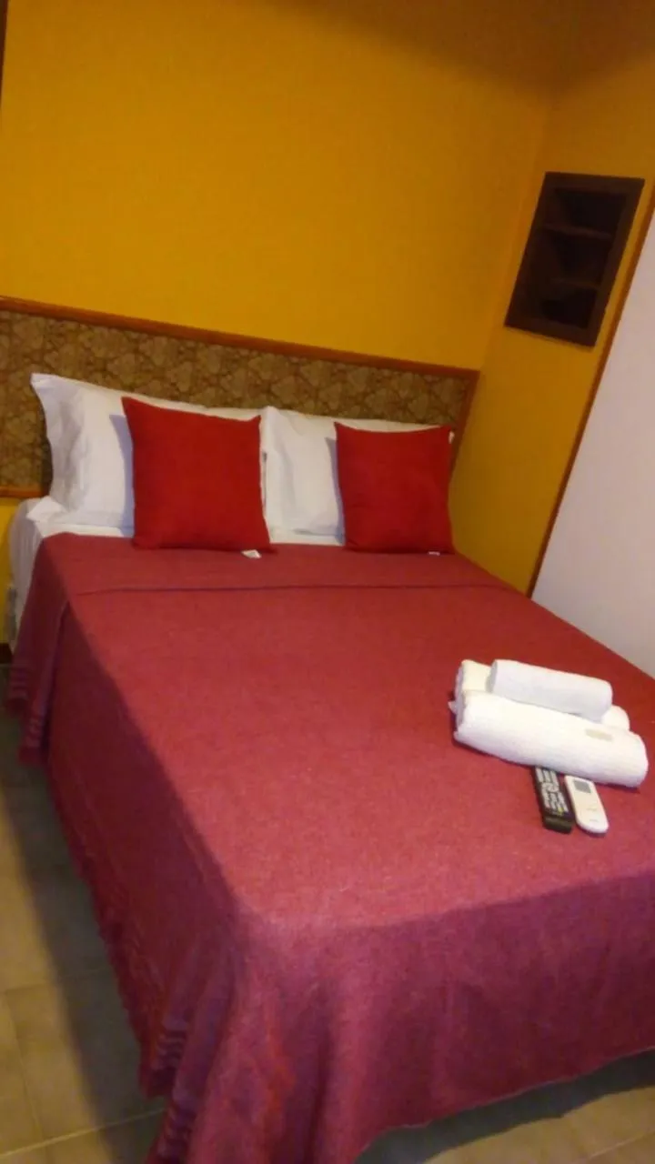Bed in El Uru Suite Hotel