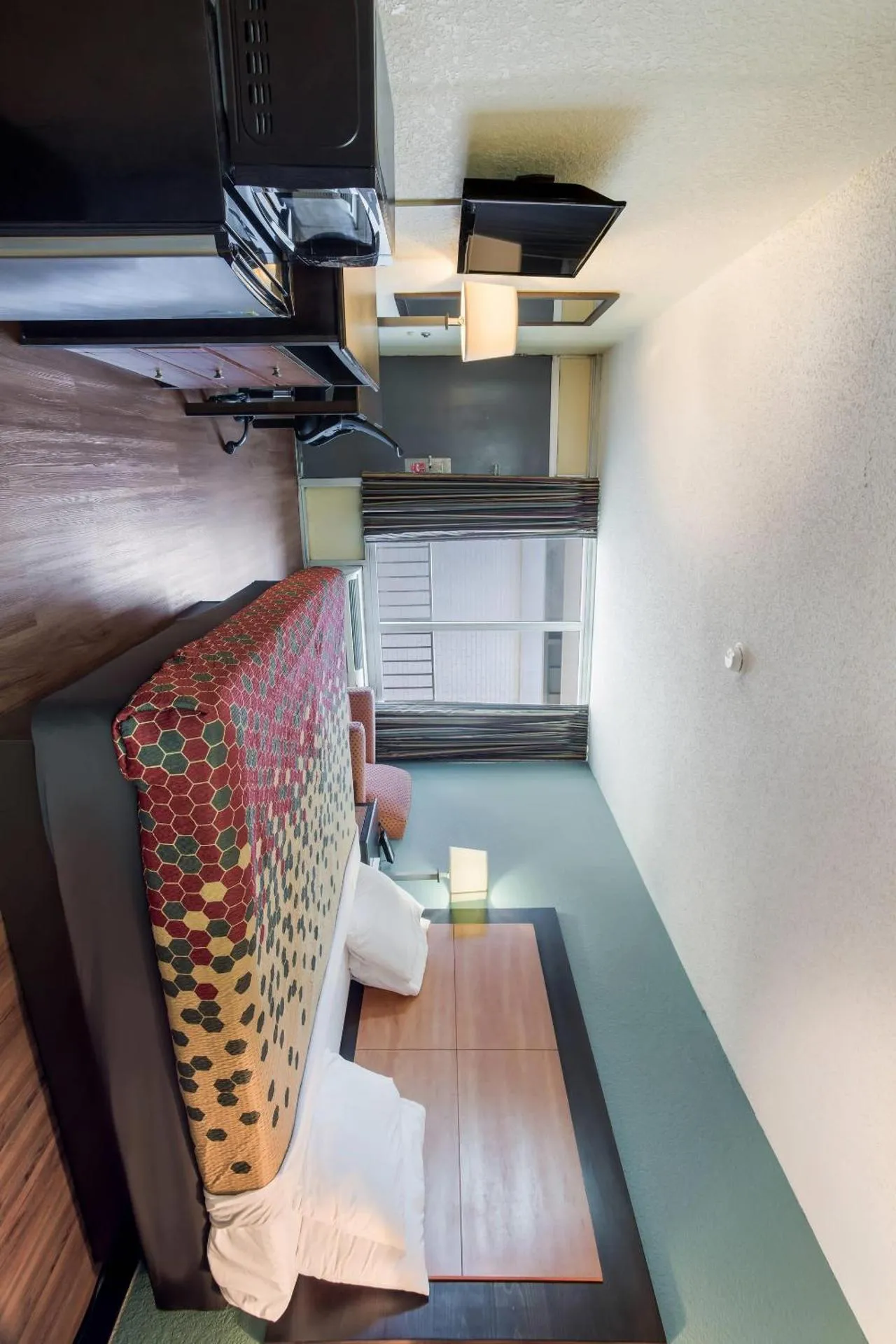 Bedroom, Bed in Econo Lodge Gallatin - Metro Nashville