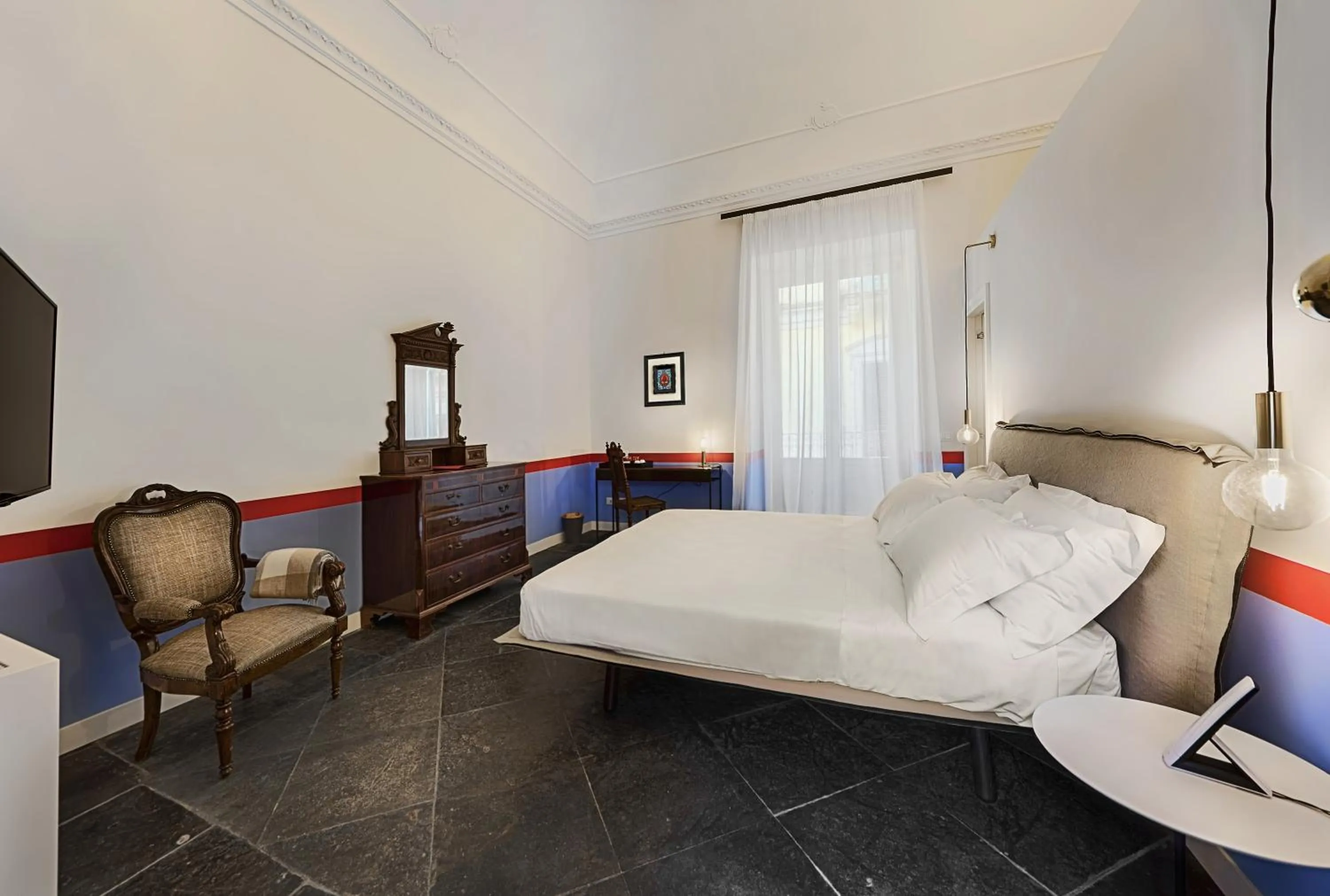 Photo of the whole room, Bed in A.D. 1768 Boutique Hotel