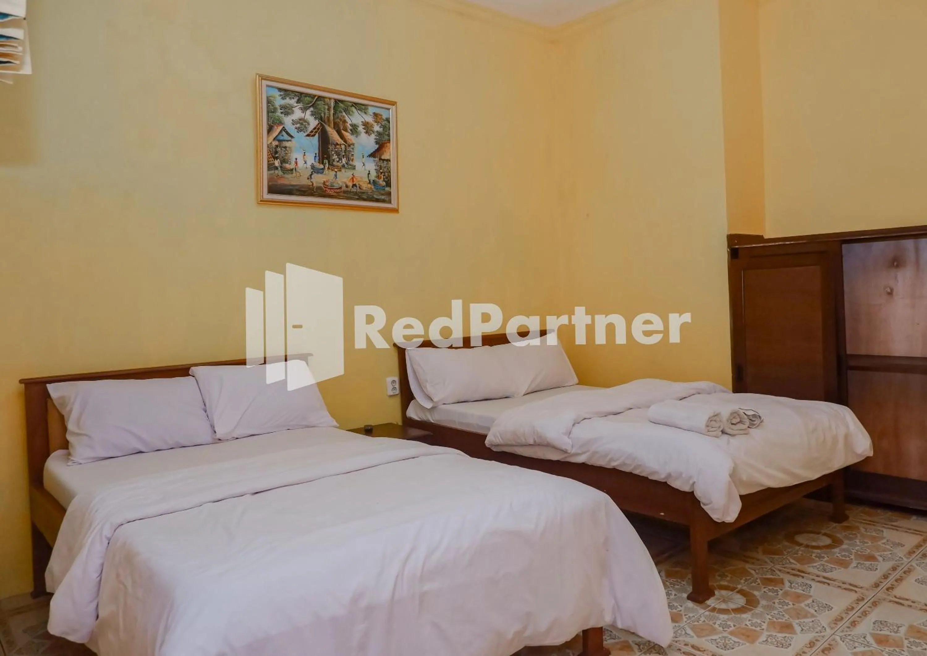 Bedroom, Bed in MS Hotel Pangandaran Mitra RedDoorz