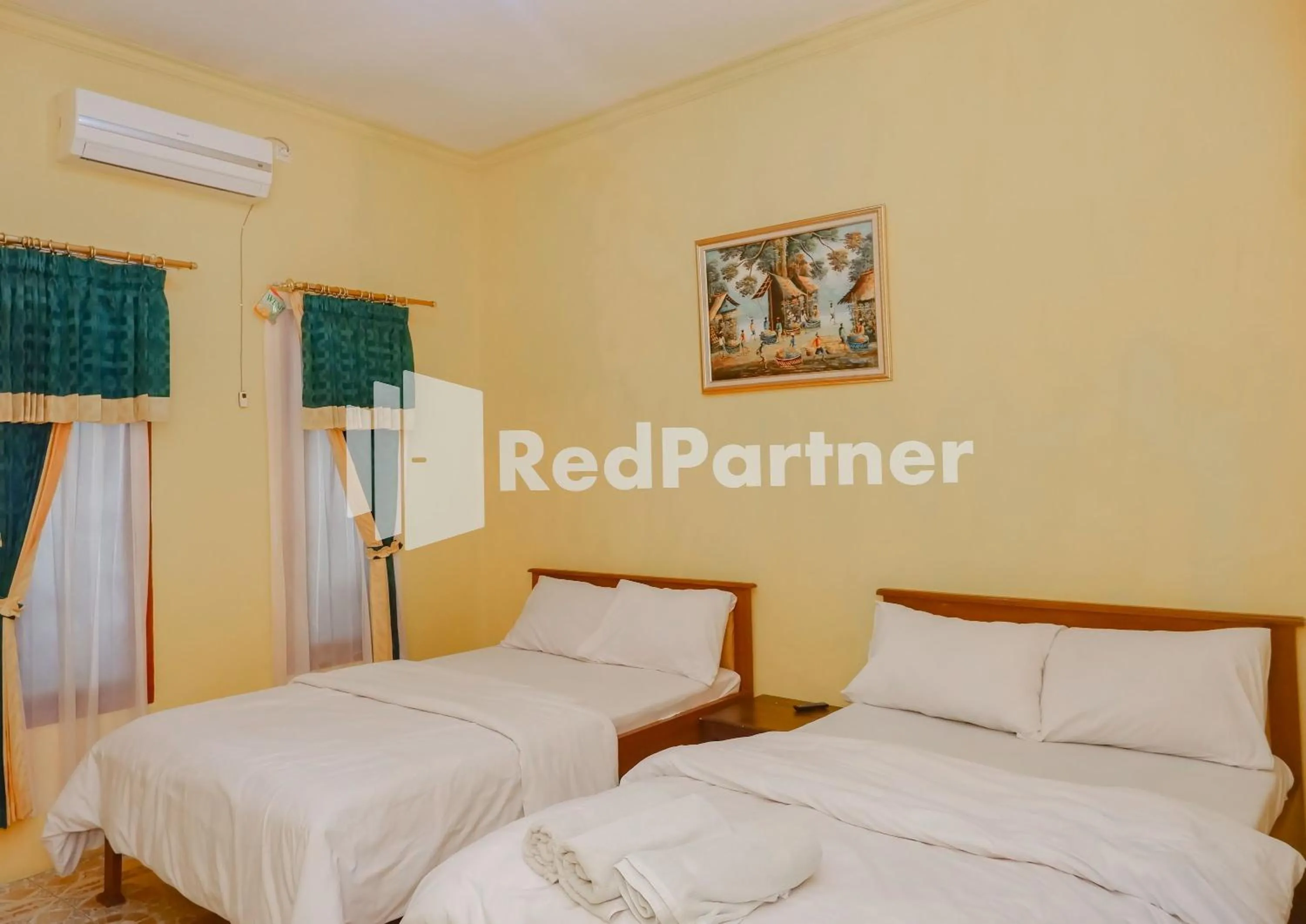 Bedroom, Bed in MS Hotel Pangandaran Mitra RedDoorz