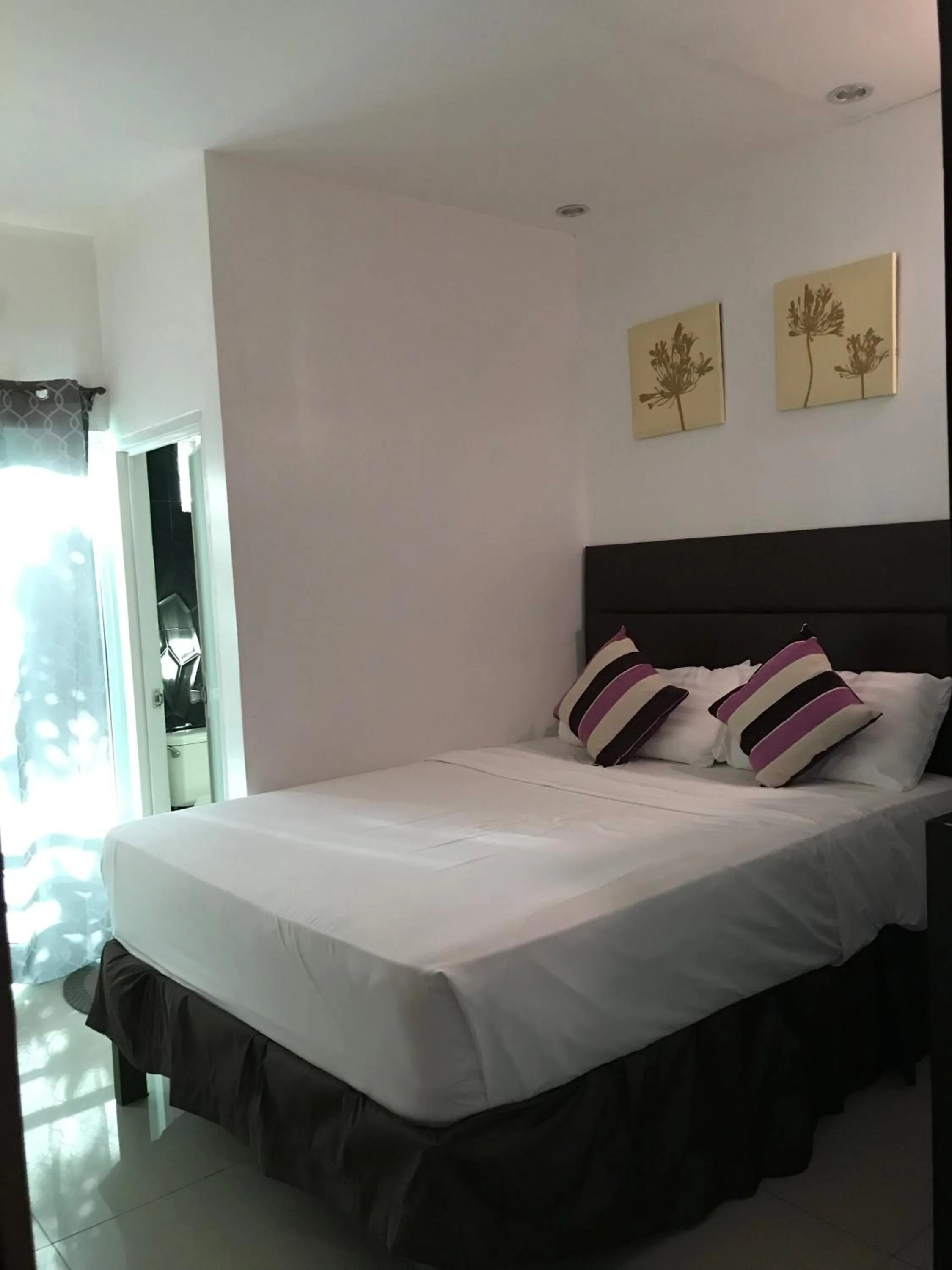 Bed in The Blanket Hotel Restaurant & Coffee