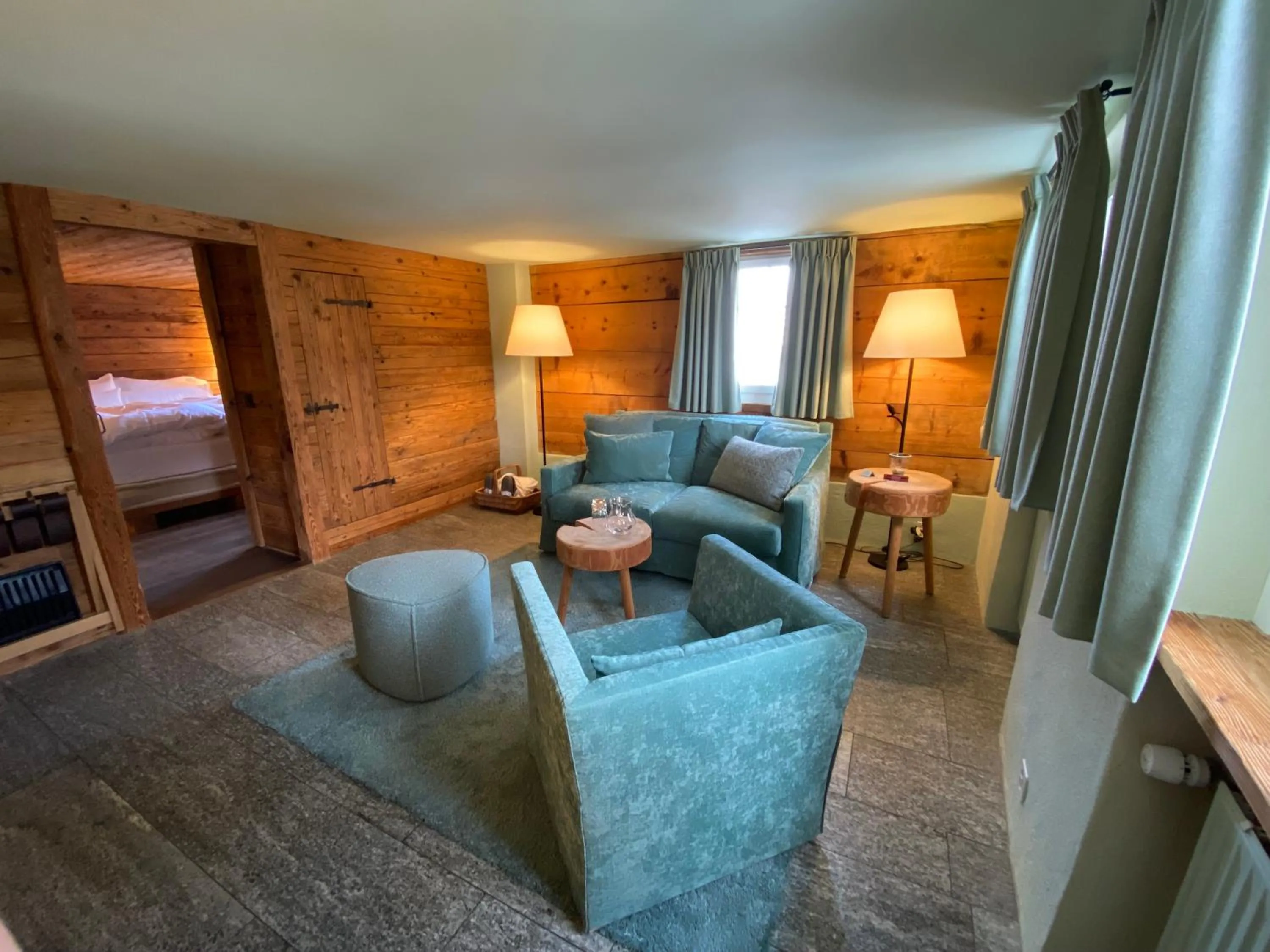 Living room, Bed in Maiensässhotel Guarda Val