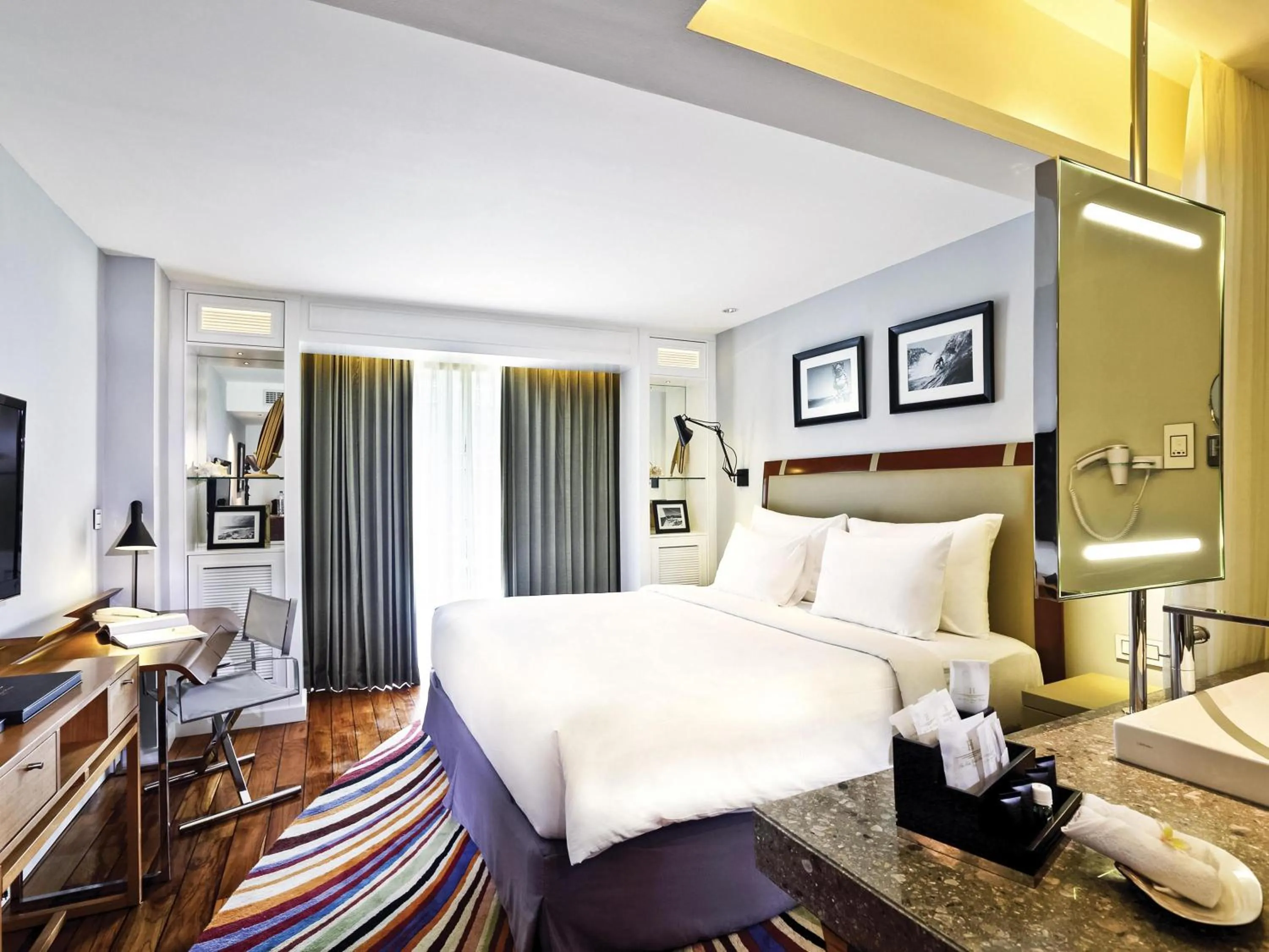 Bedroom, Bed in The Kuta Beach Heritage Hotel - Managed by Accor