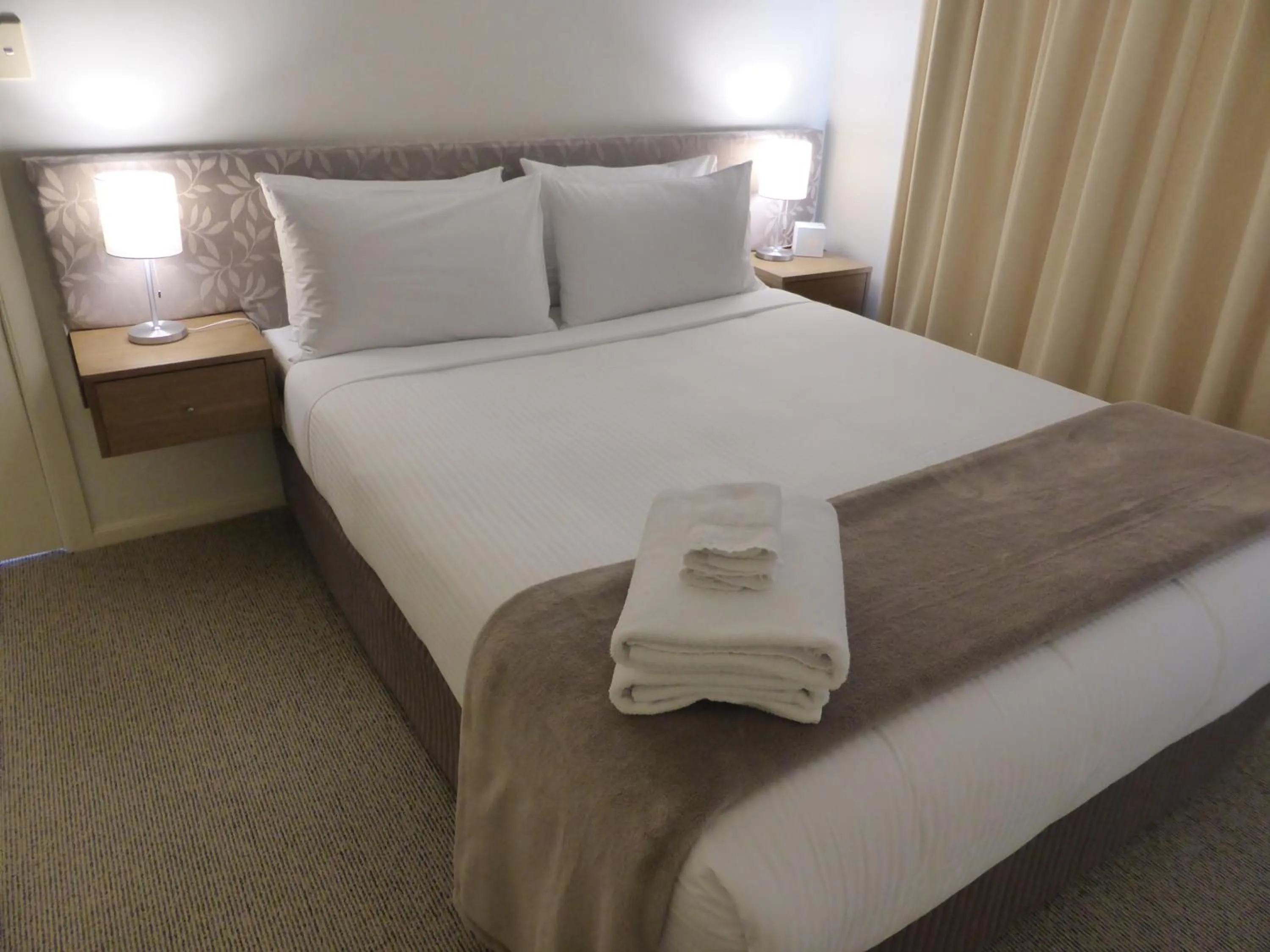 Bedroom, Bed in Lifestyle Apartments at Ferntree