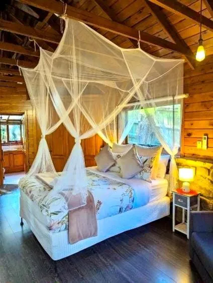 Bed in Forget Me Not Cottages