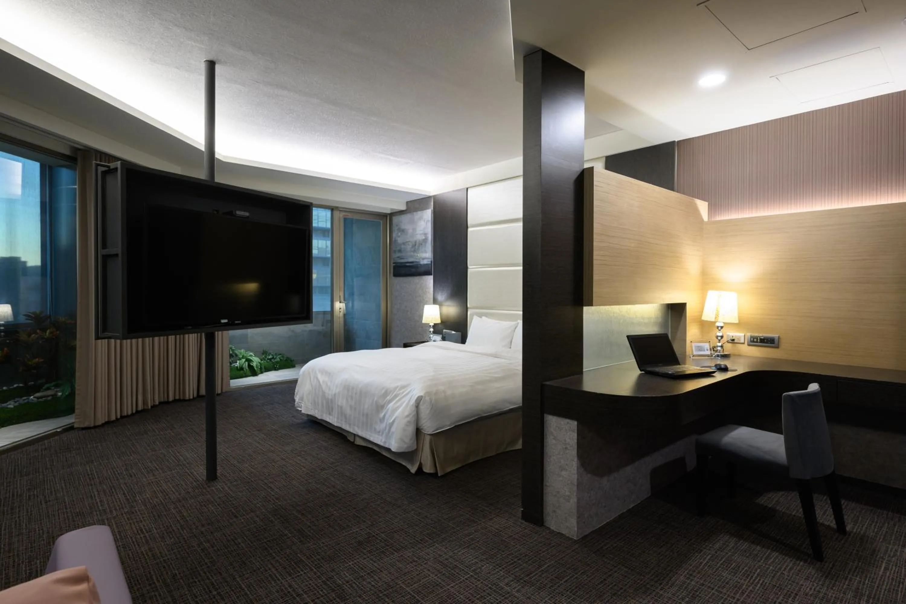 Bed in Hotel Geight Taipei