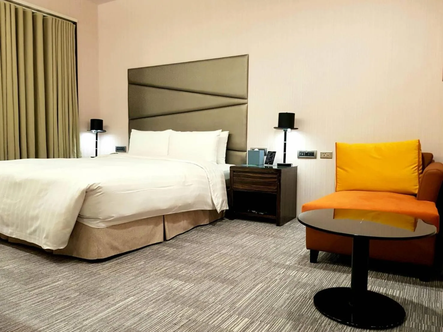 Bed in Hotel Geight Taipei