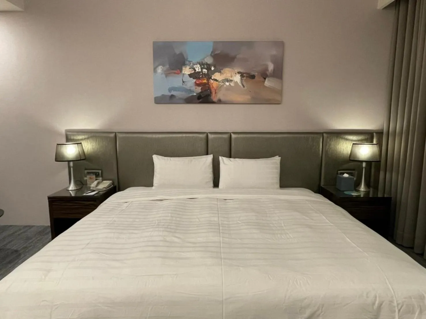 Bed in Hotel Geight Taipei