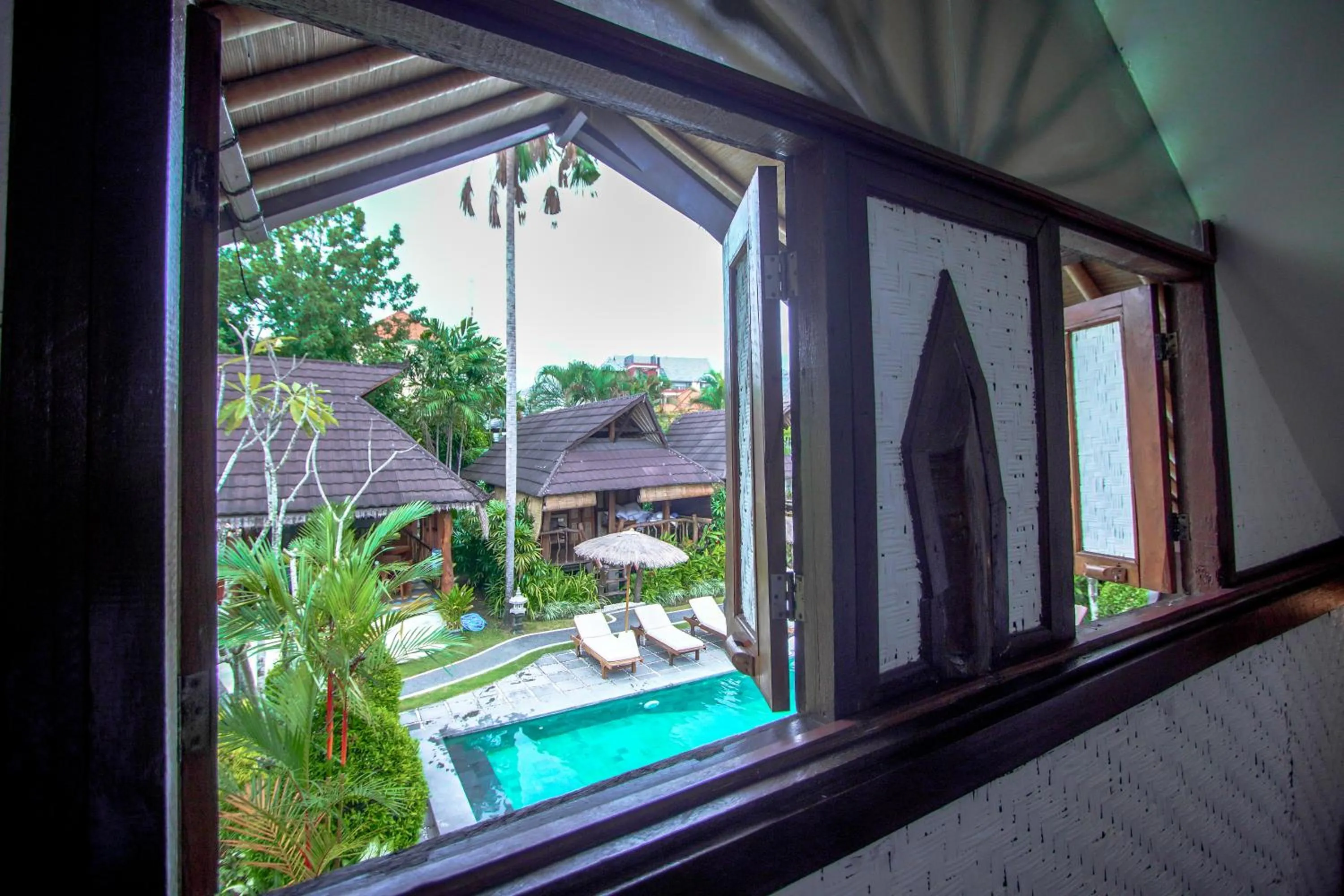 Bedroom in The Calmtree Bungalows