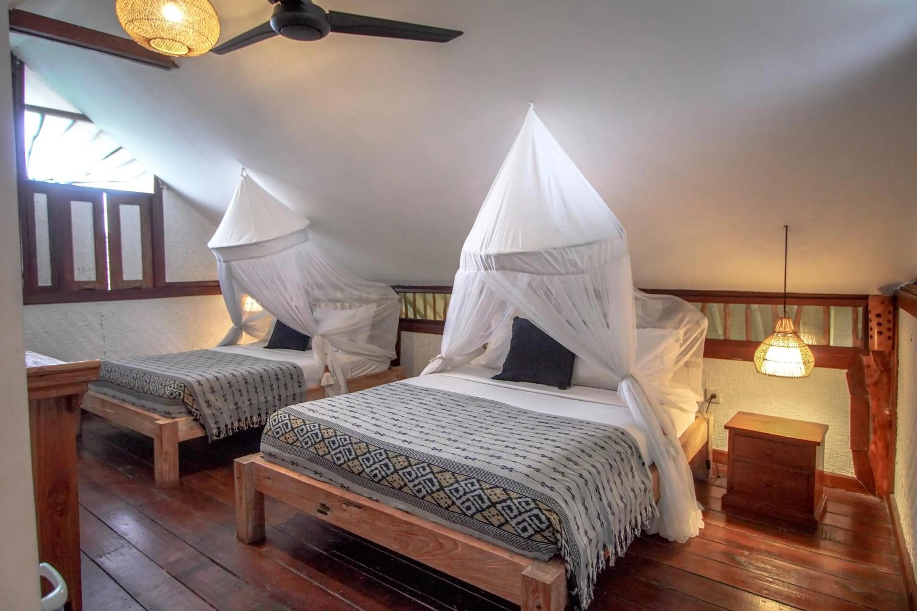 Bed in The Calmtree Bungalows