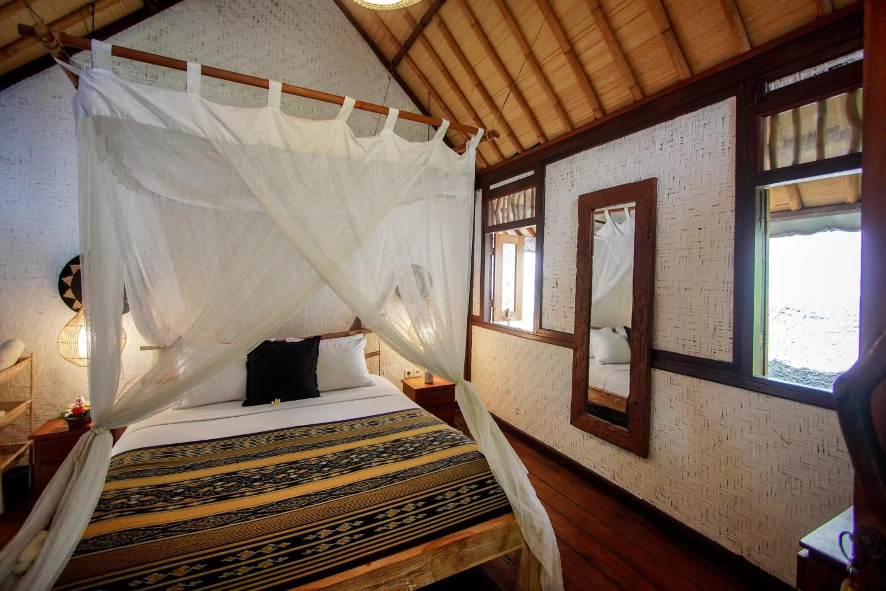 Bed in The Calmtree Bungalows