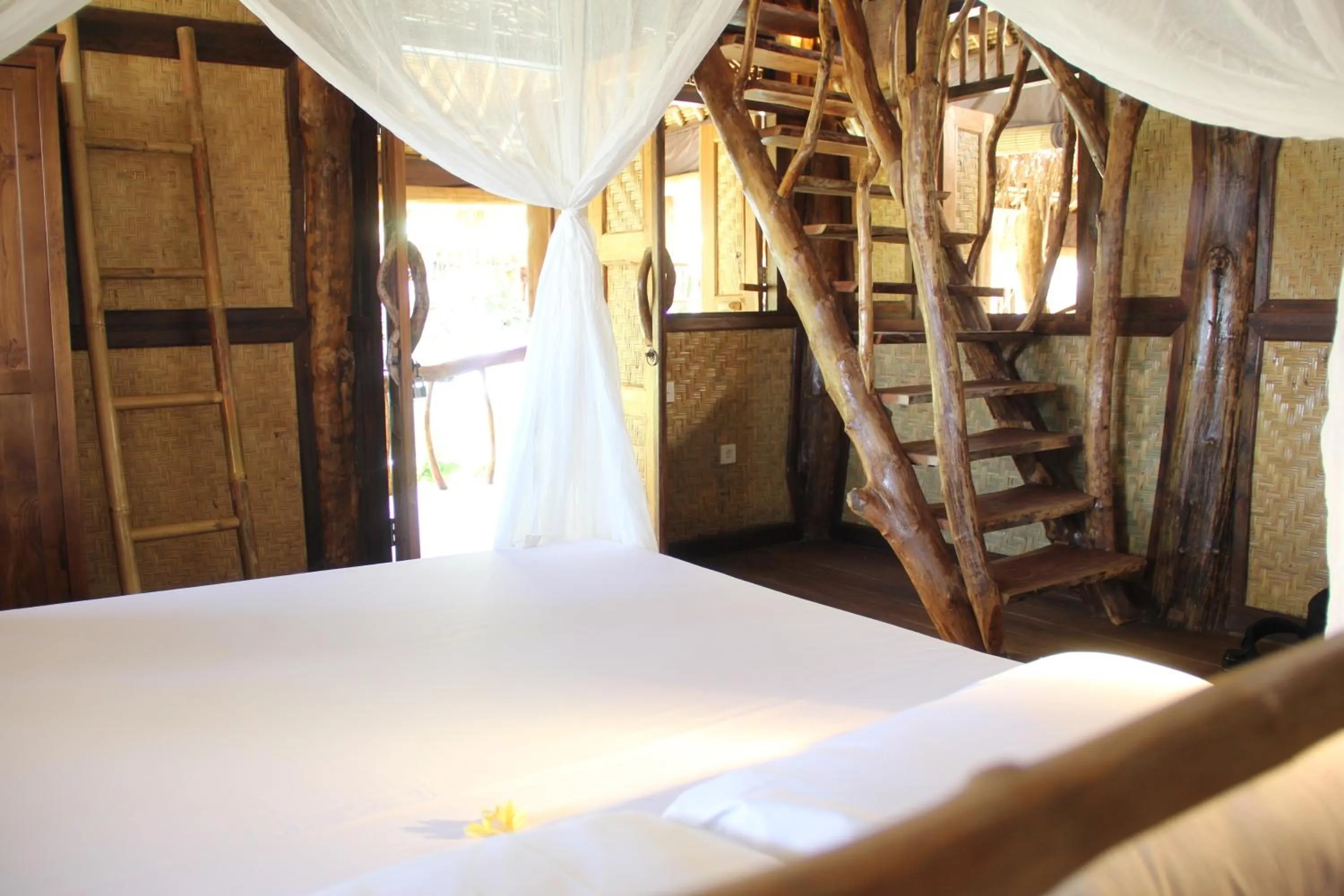 Bed in The Calmtree Bungalows