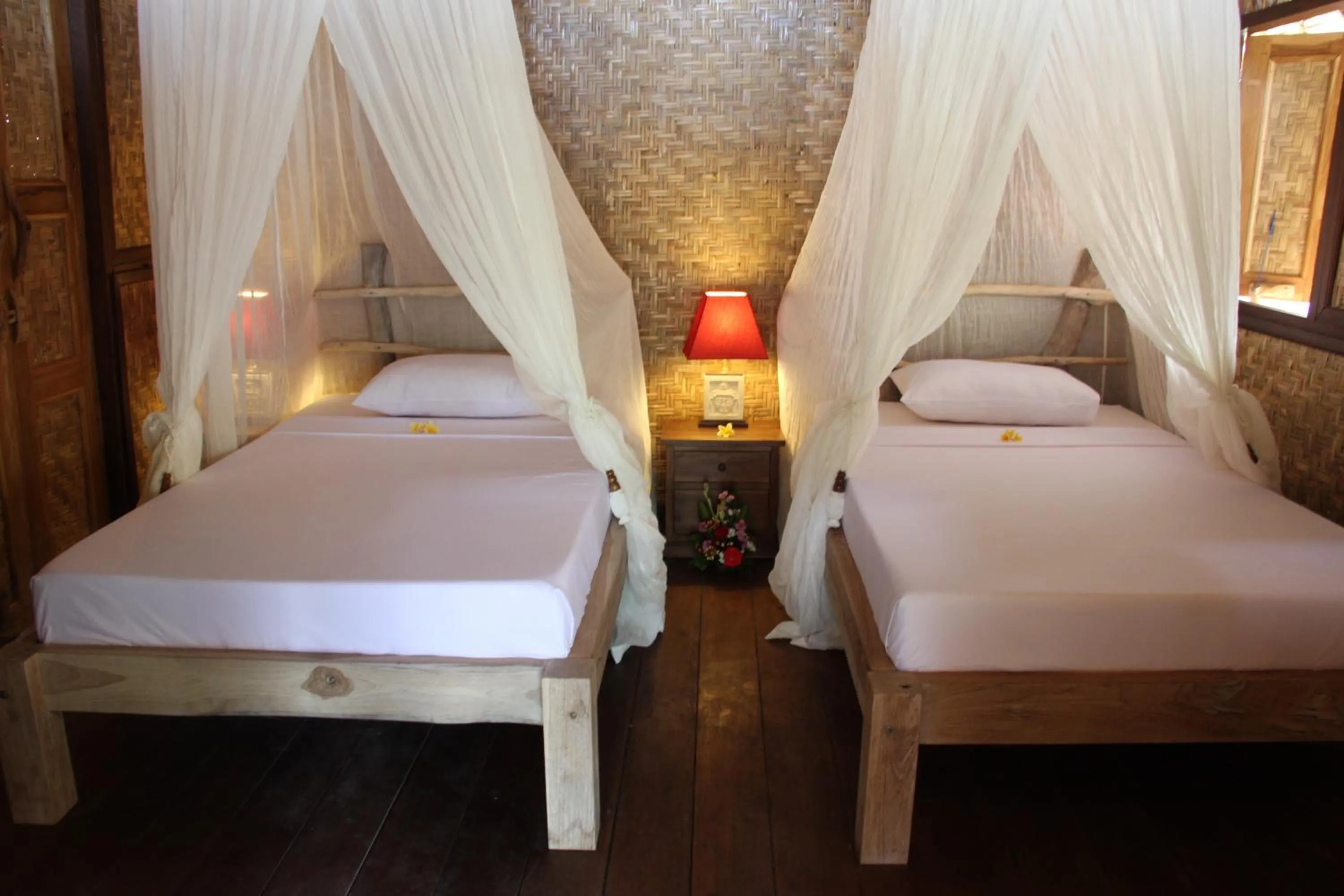 Bed in The Calmtree Bungalows