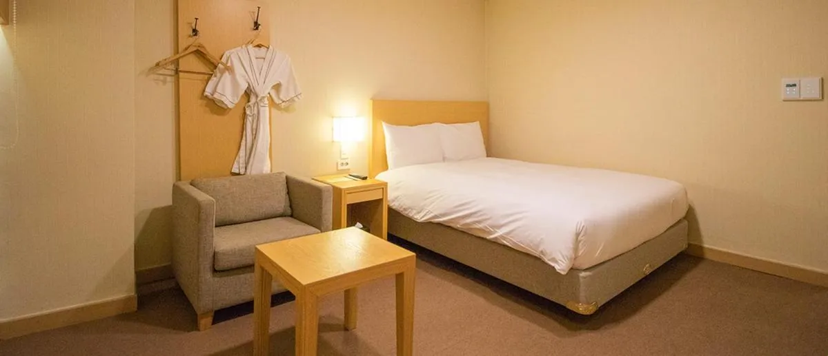 Bed in Towerhill Hotel