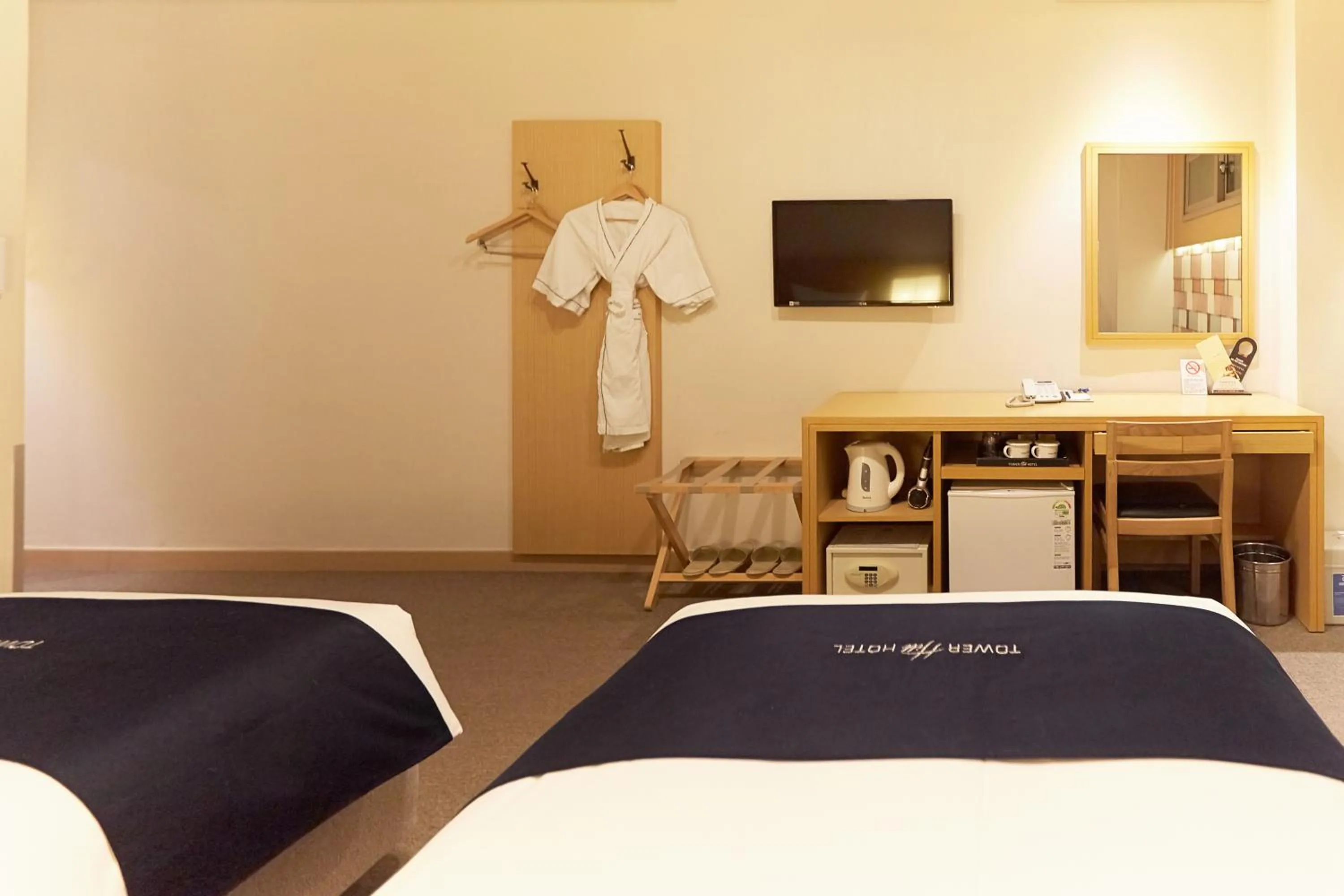 Bed in Towerhill Hotel