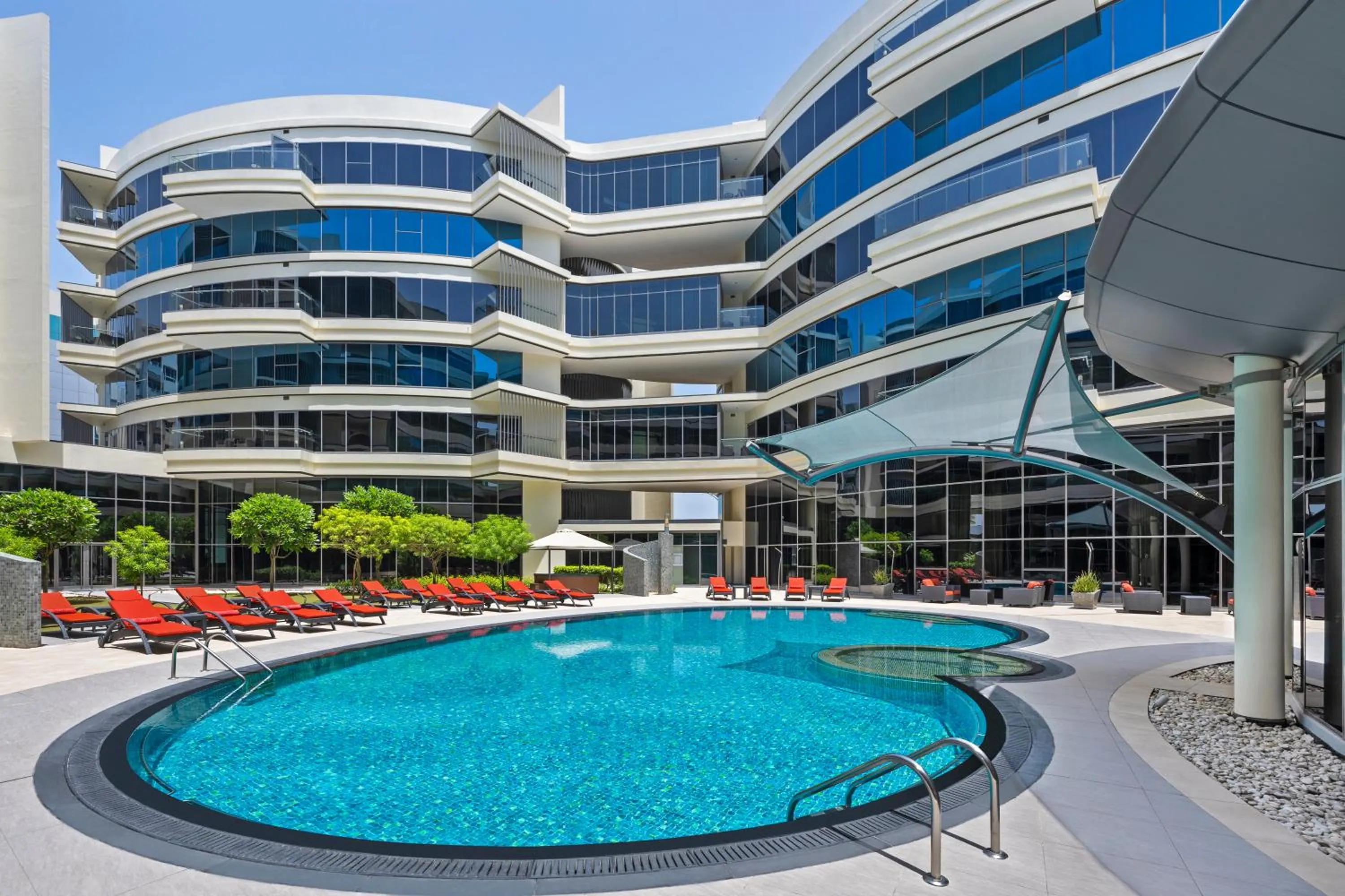 Swimming pool in Majestic Arjaan by Rotana – Manama