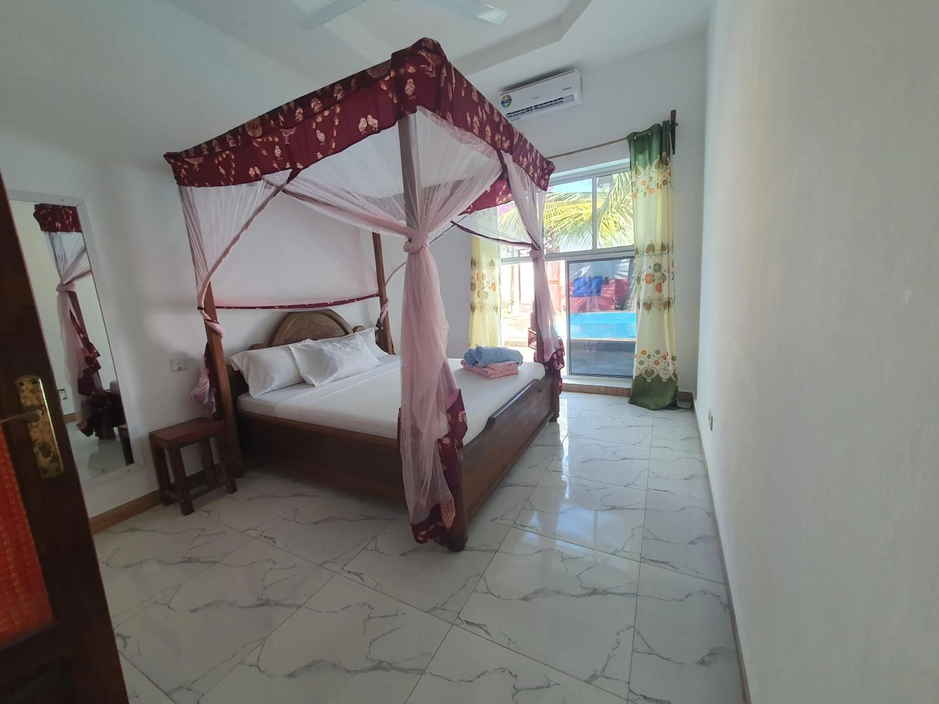 Bed in BARIDI VILLA