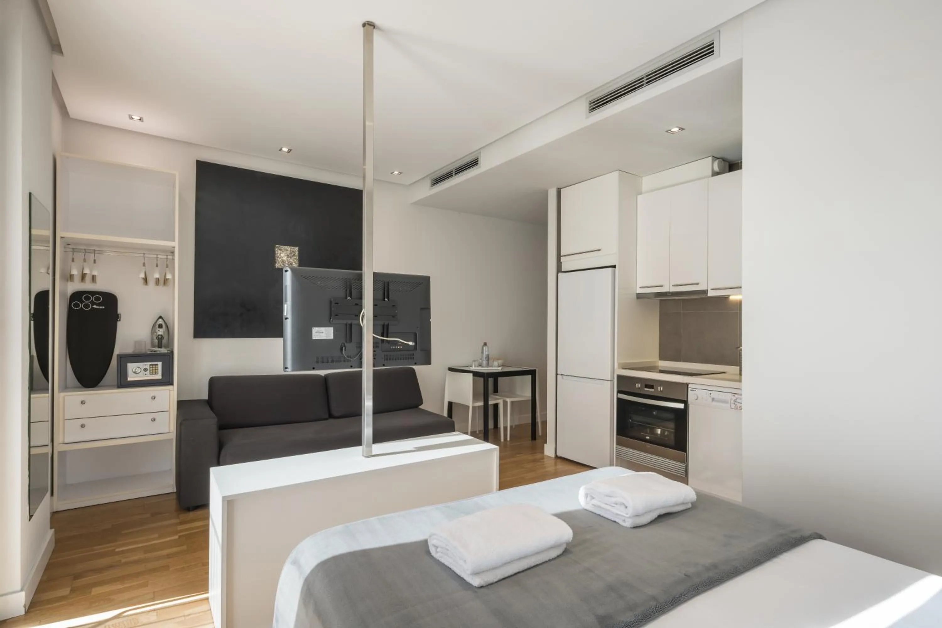 Bed in Mon Suites Catedral