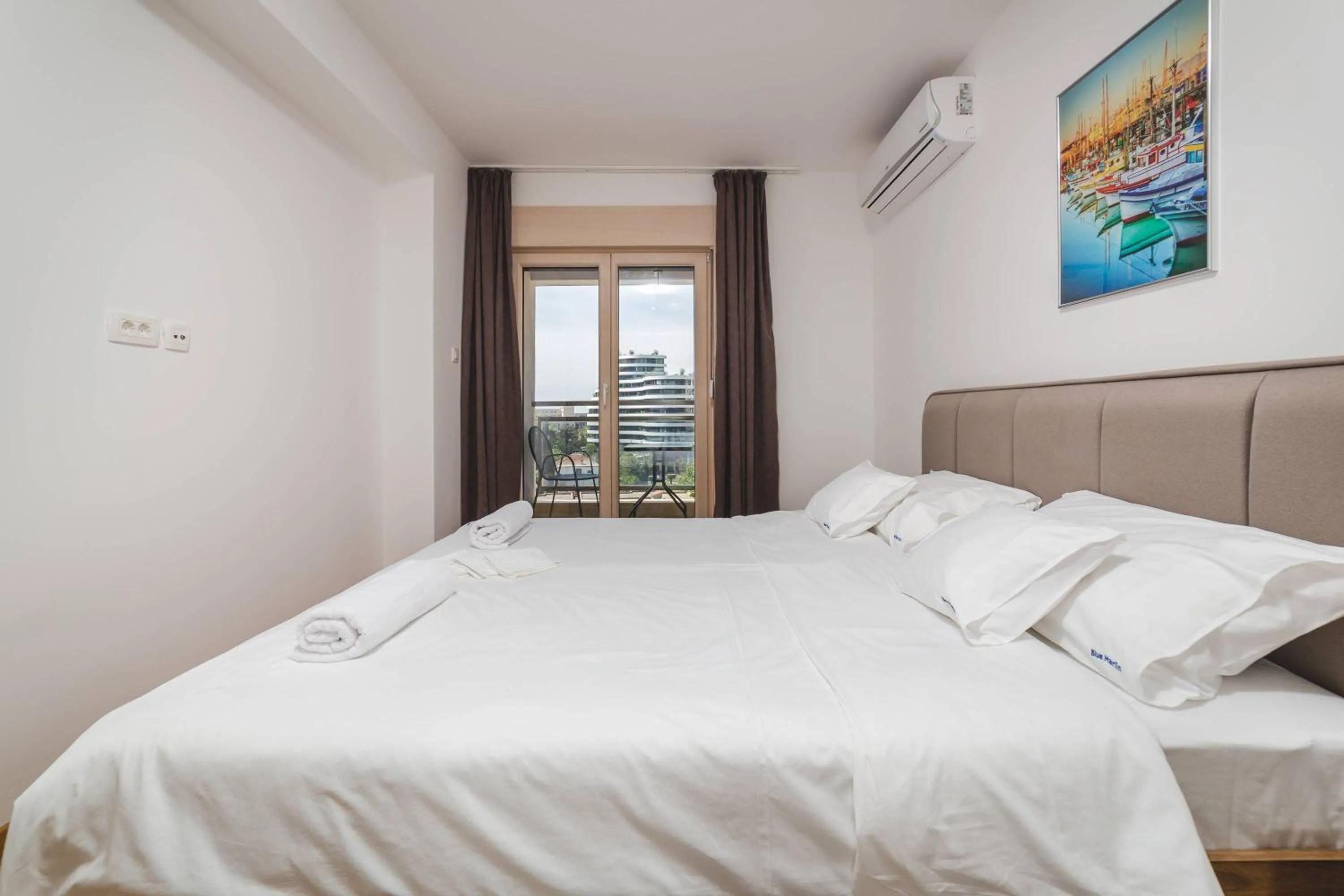 Bed in Blue Marlin Apartments