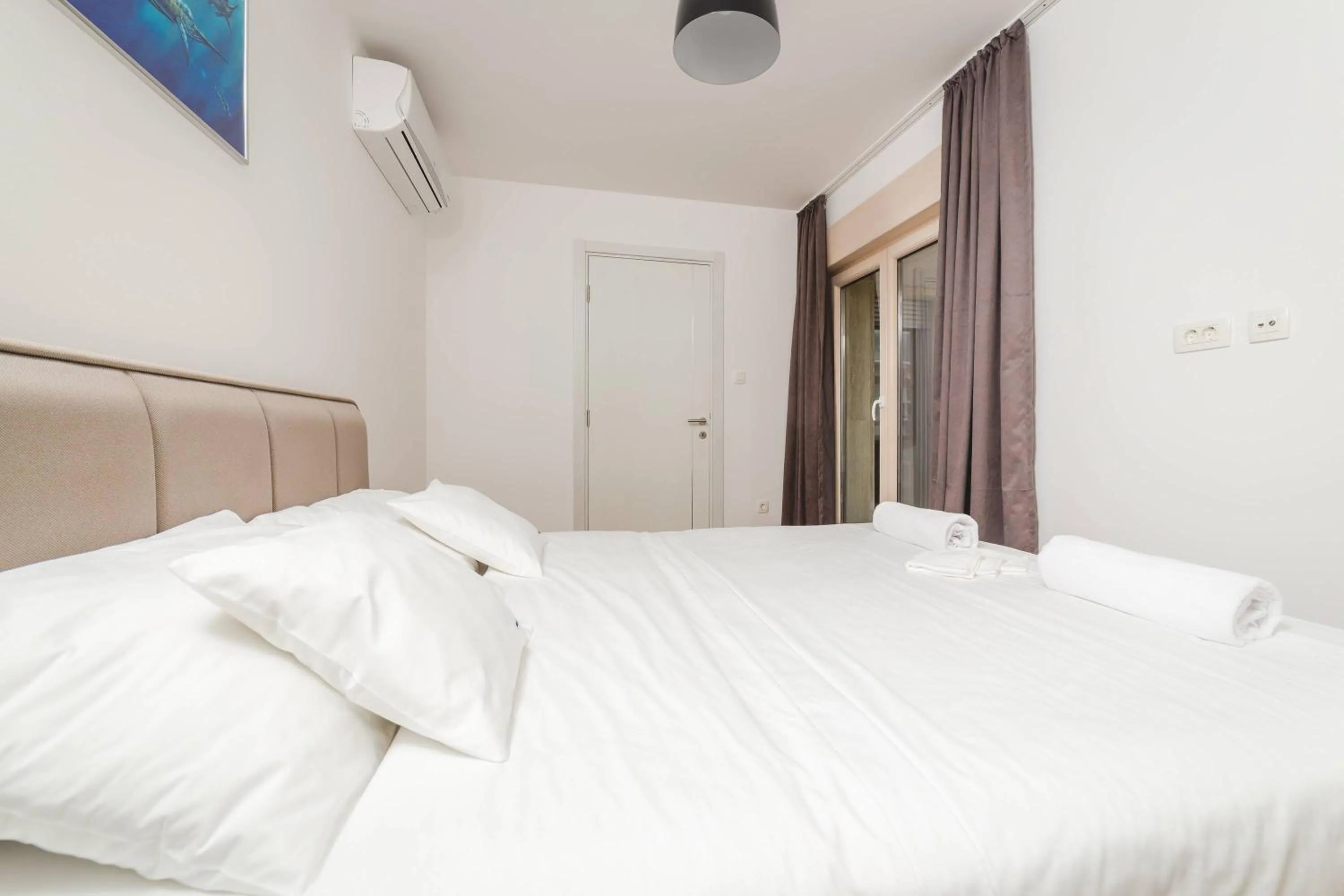 Bed in Blue Marlin Apartments