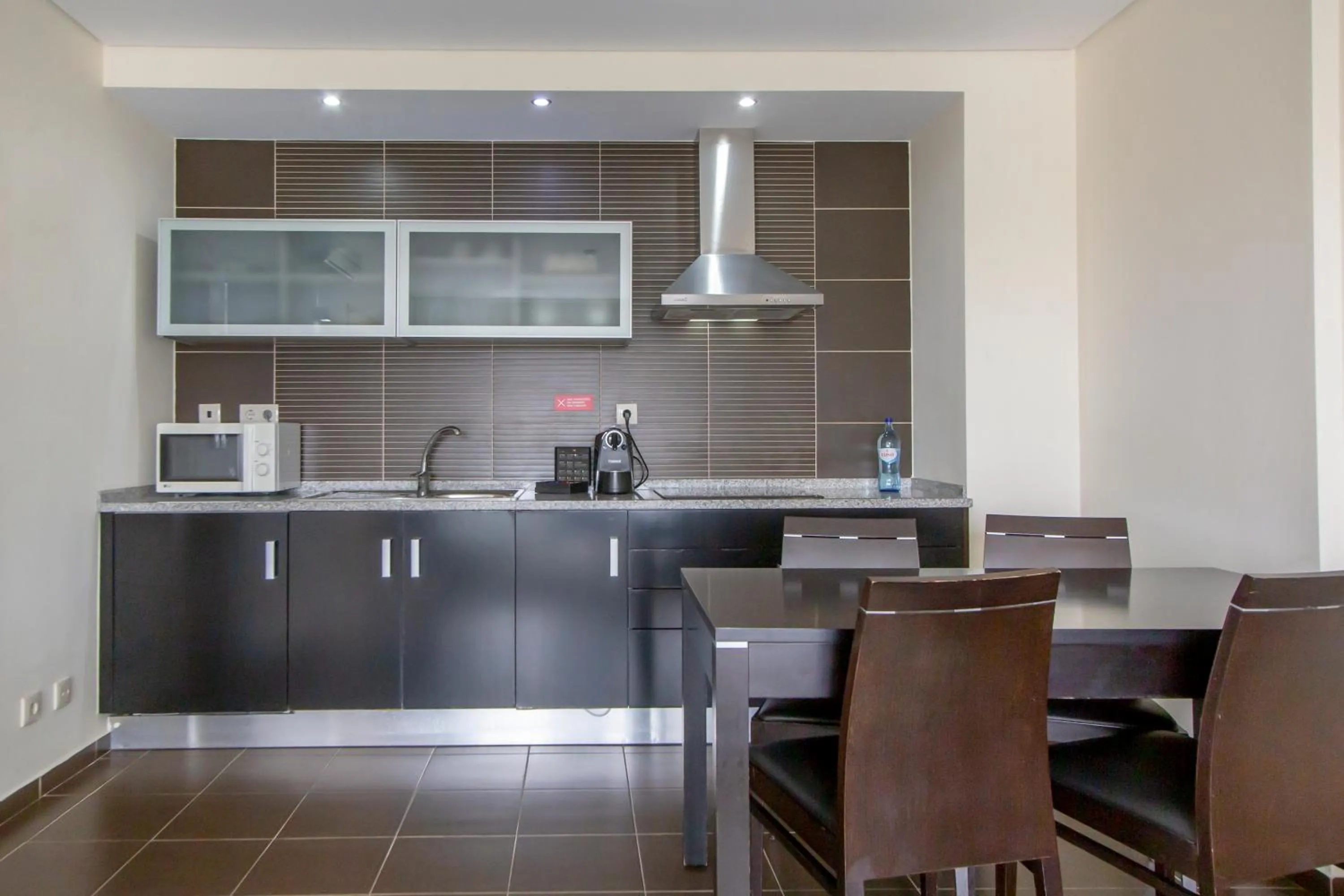 kitchen in Areias Village Beach Suite Hotel